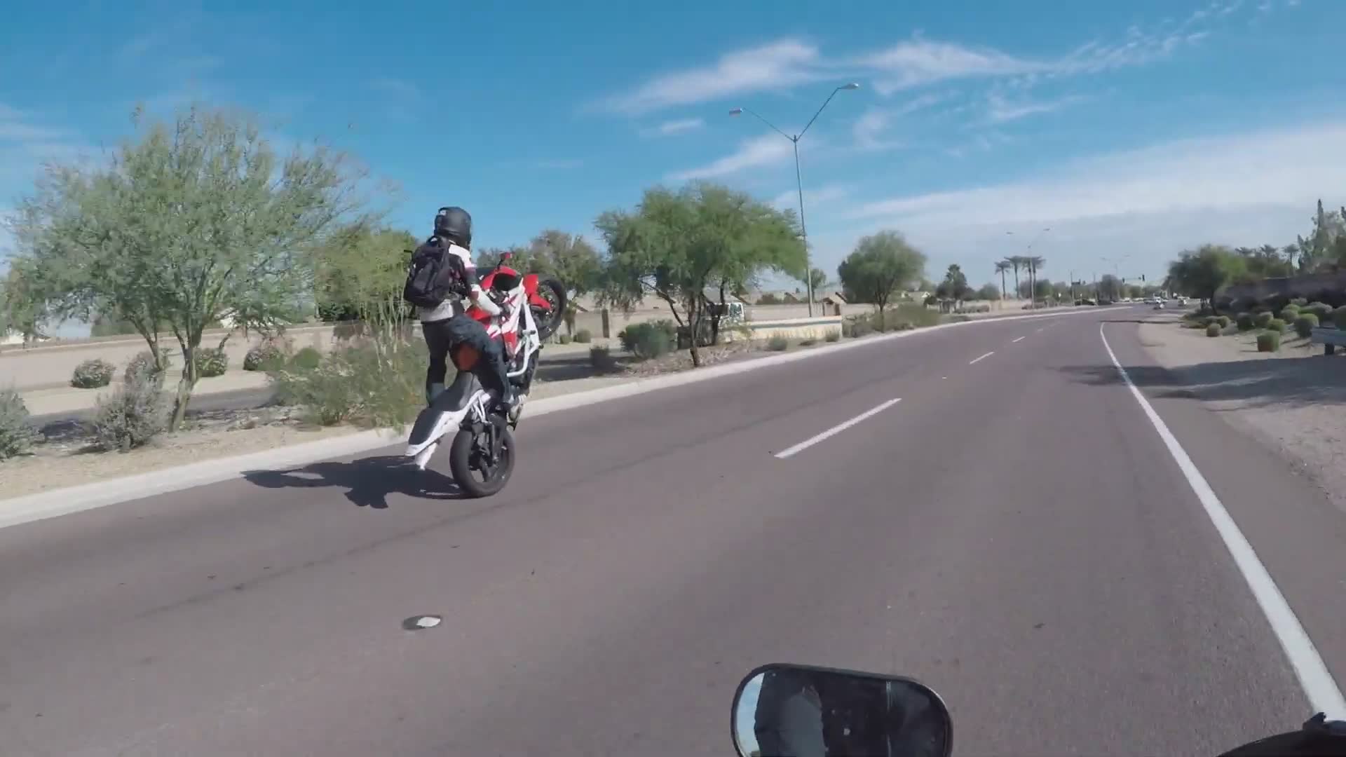 Handing out donuts while riding sport bikes