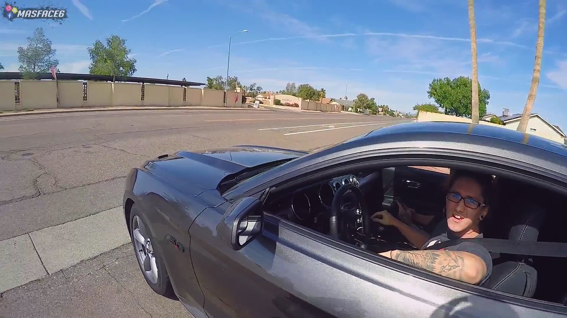 Racing a Mustang 5.0 on my bike