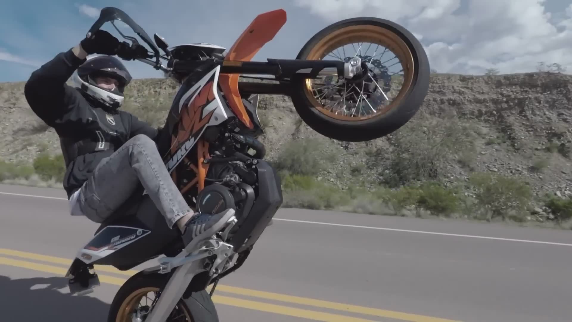 Complete motorcycle wheelie guide