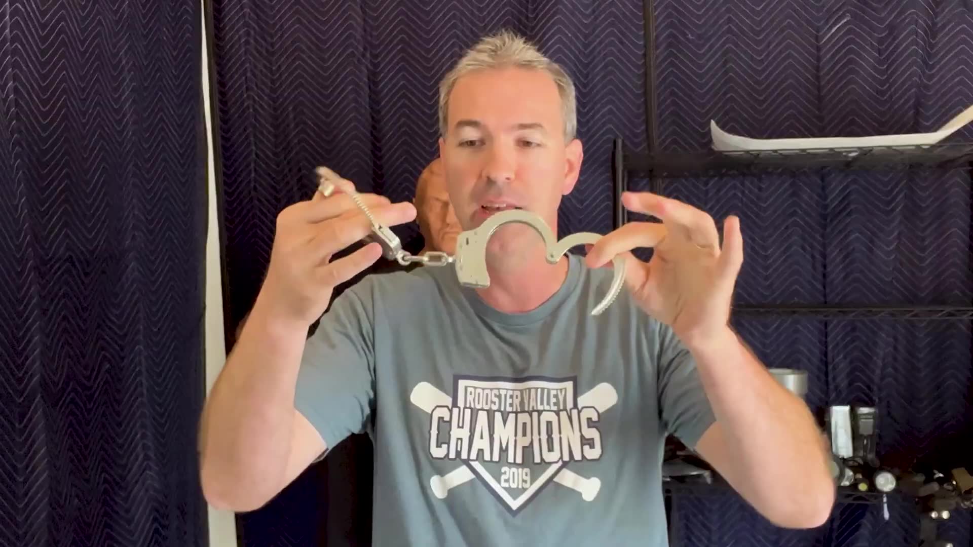Ex-CIA officer demonstrates escape technique using simple hair accessory to defeat handcuff restraints