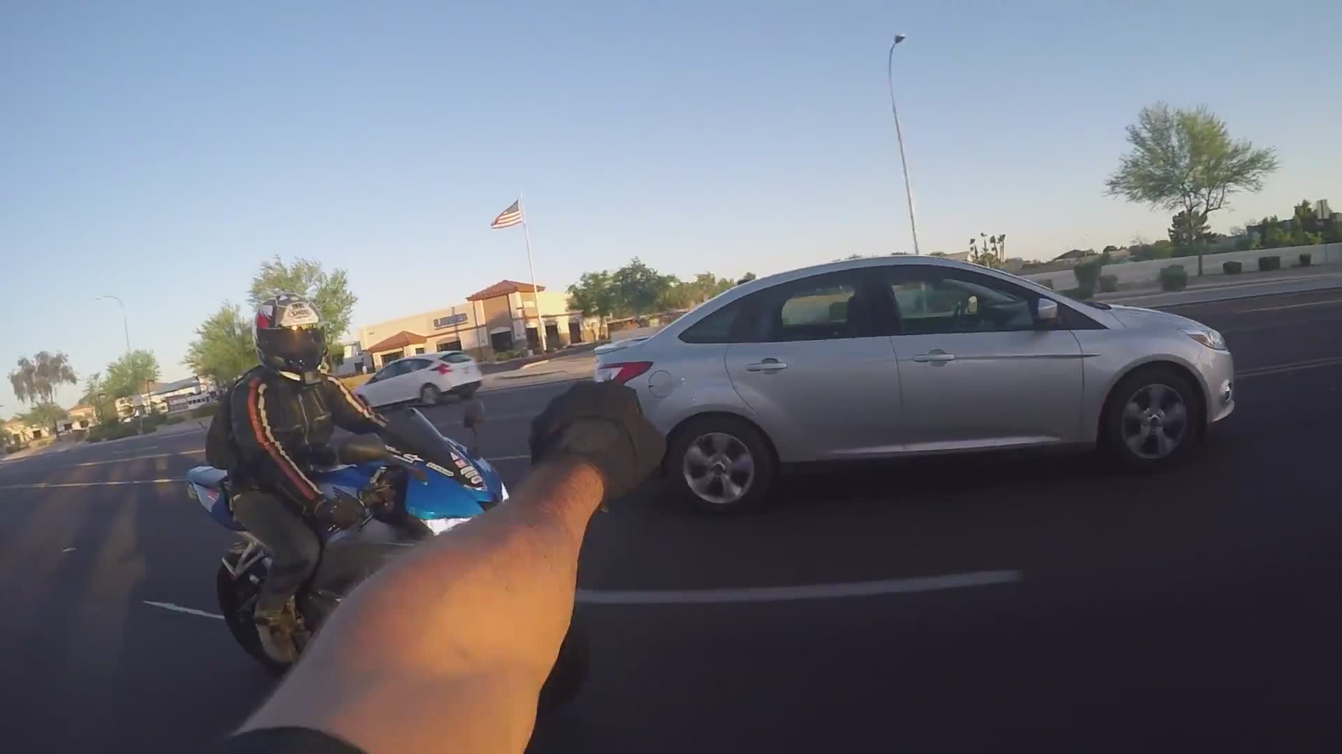 Close call captured on miniature motorcycle as rider narrowly avoids serious accident