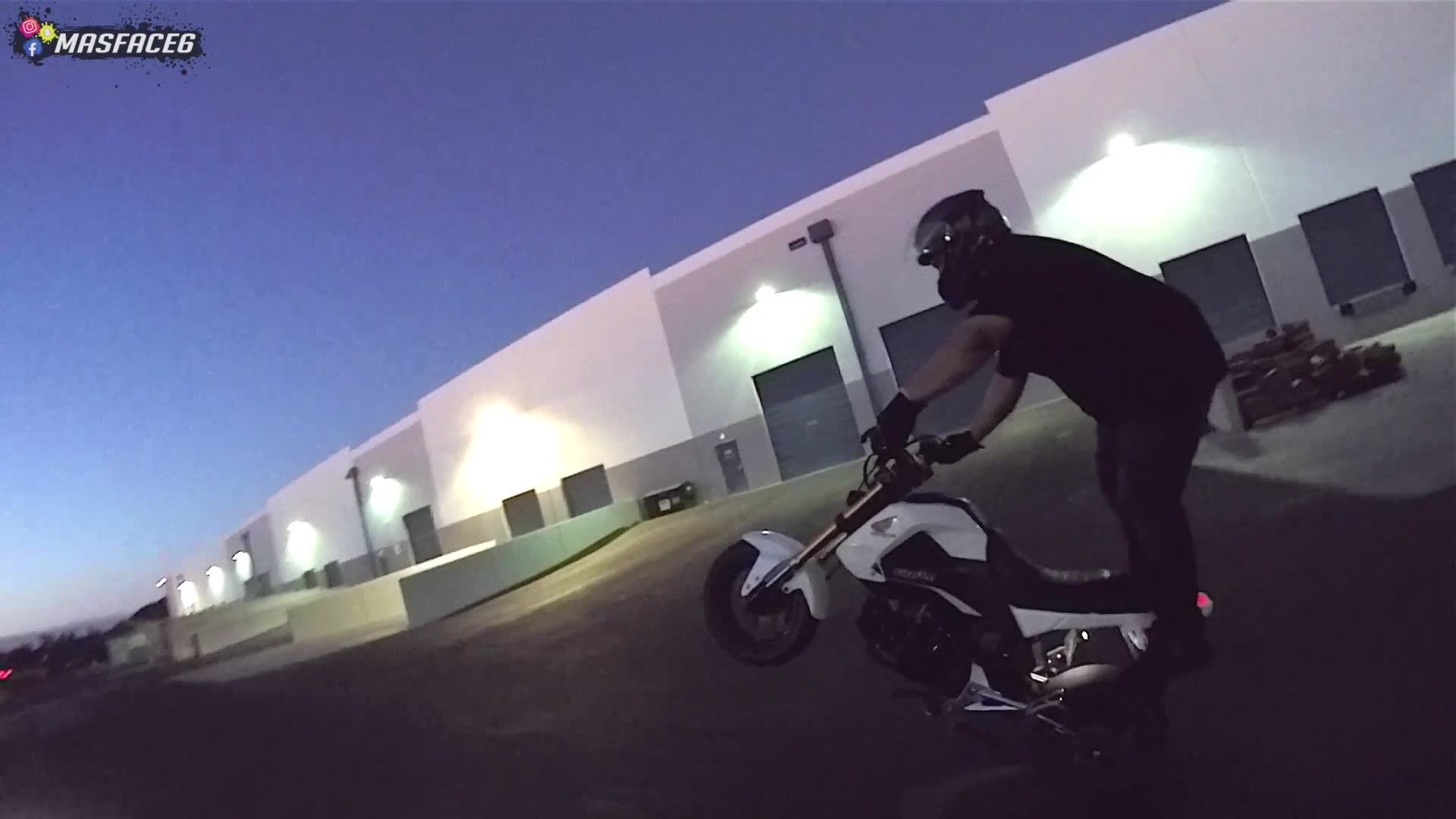 Alternative wheelie technique utilizing rear brake control for initiation