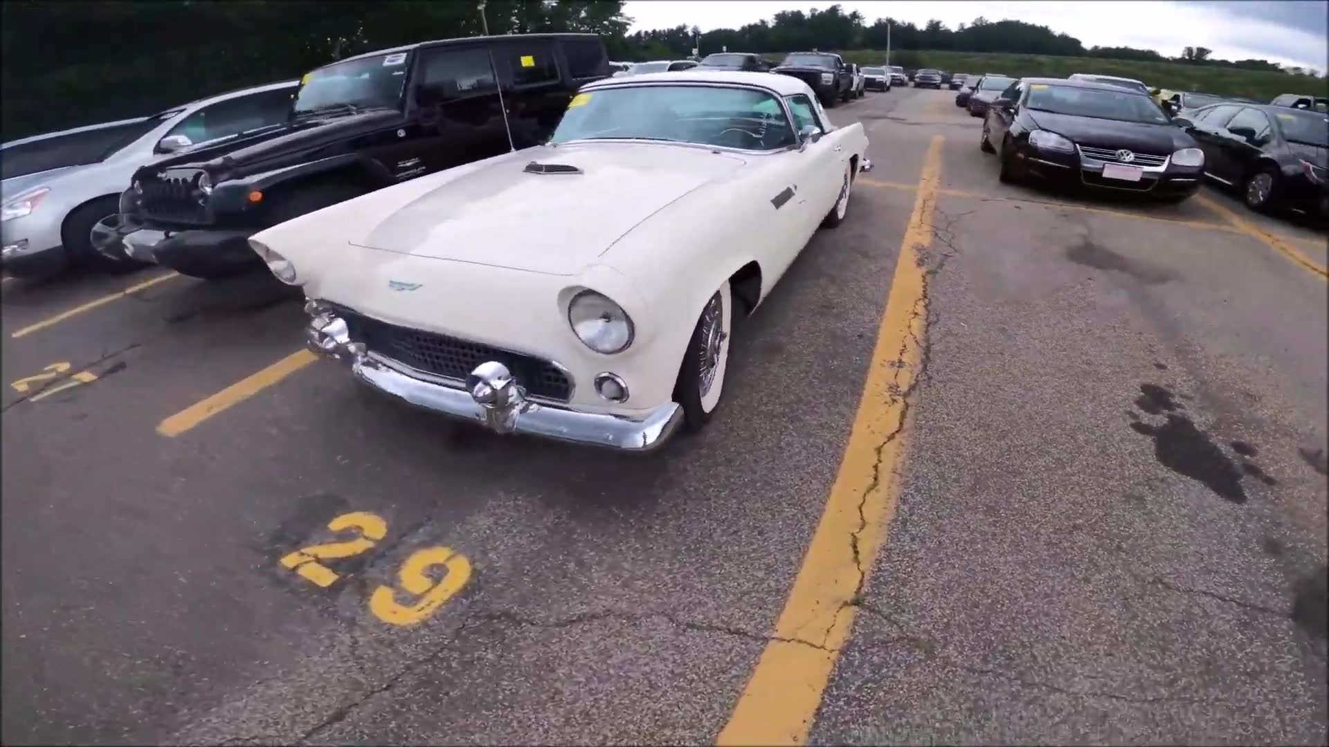 Attending a dealer exclusive classic and vintage car auction