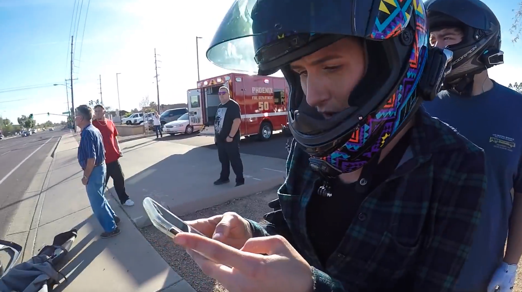 Terrifying vehicle rollover accident captured on rider's helmet camera during highway cruise