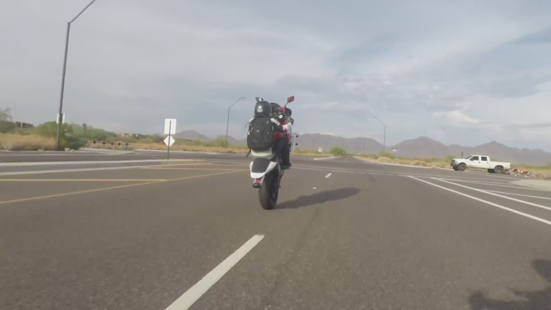 Middleweight supersport wheelie demonstration by experienced stunt rider