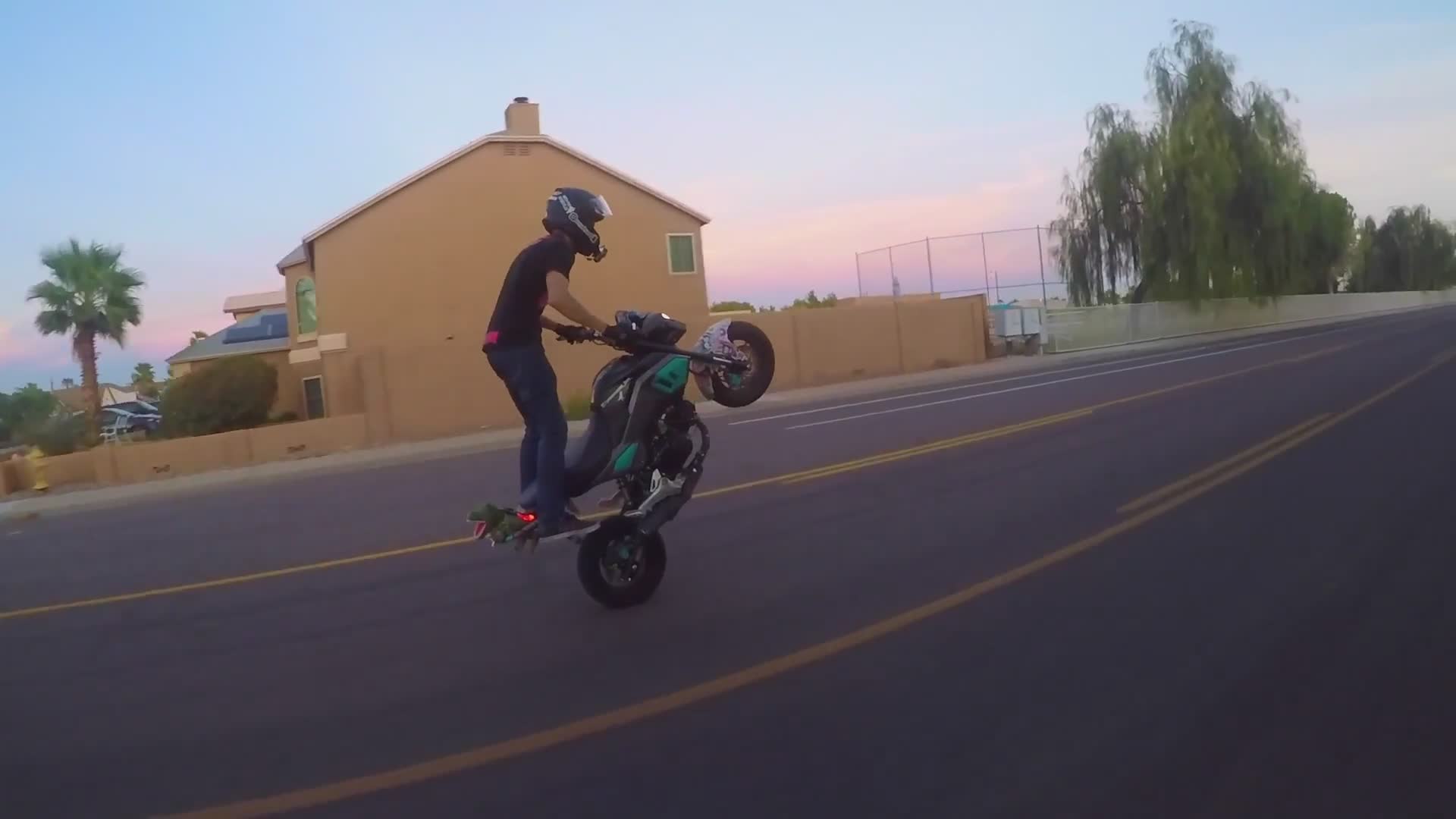 Parent experiences thrill of motorcycle stunts creating special family memory