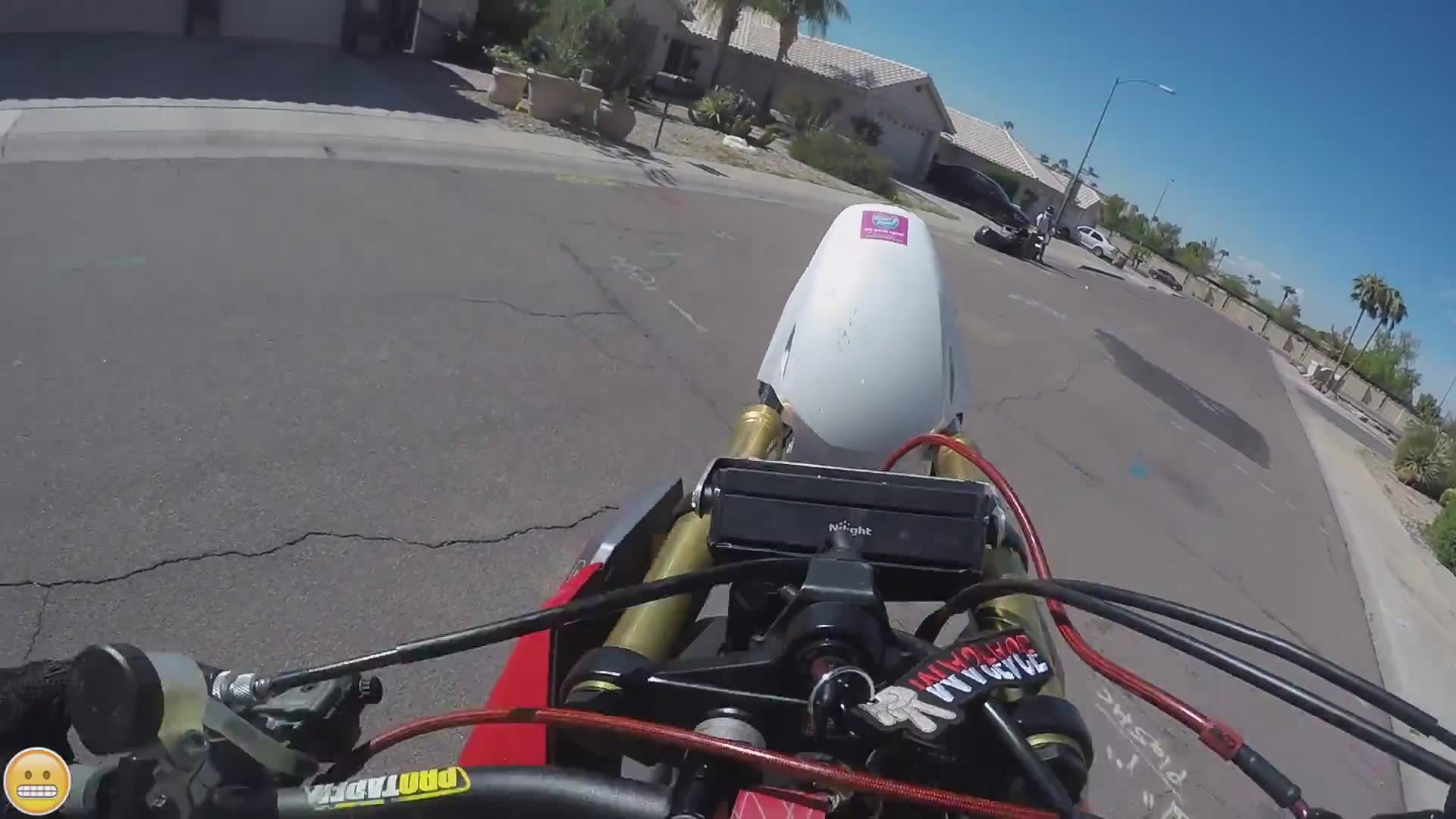 Circular wheelie patterns performed on mini motorcycles