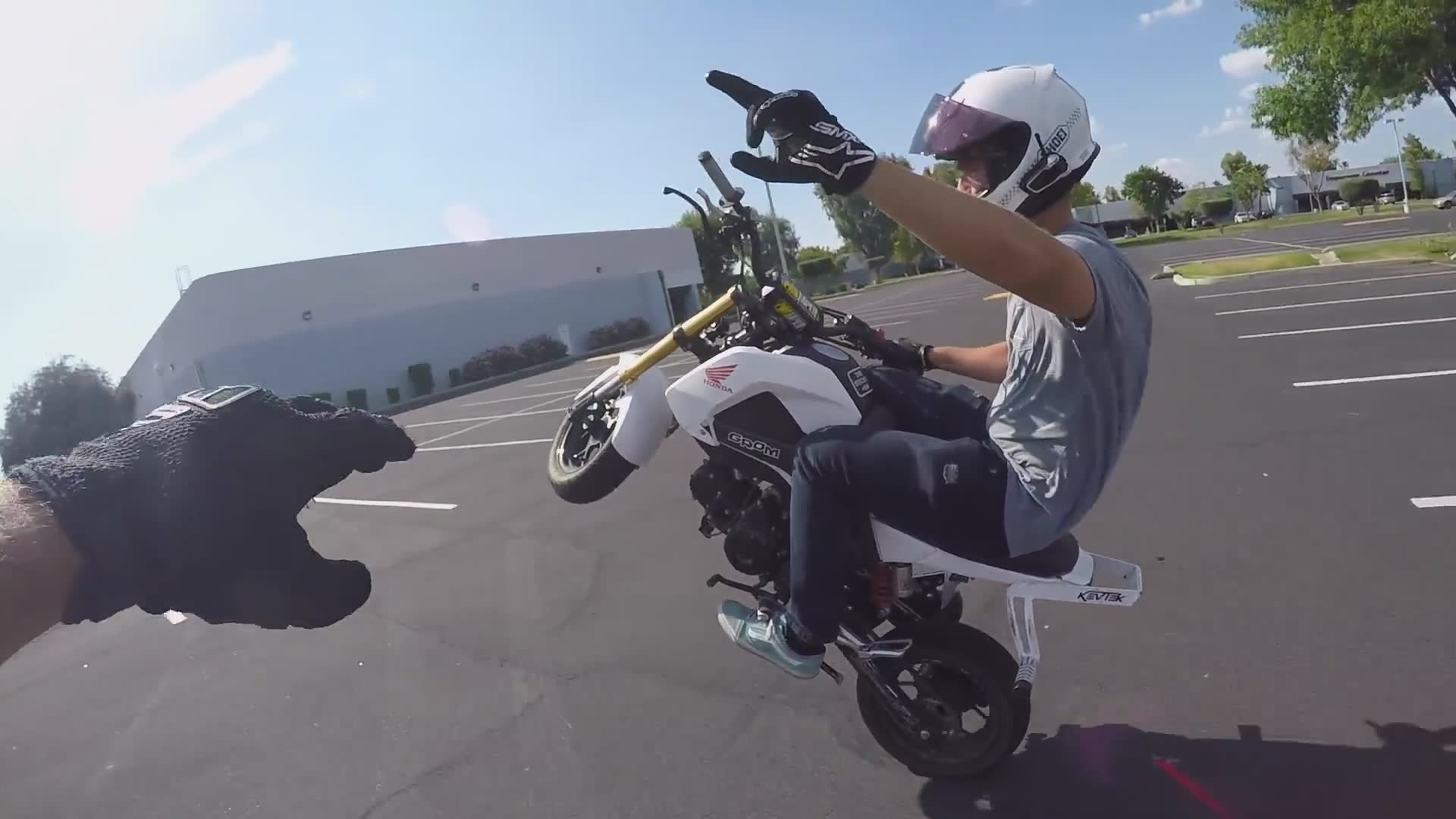 One-handed wheelie progression for advanced stunt riders