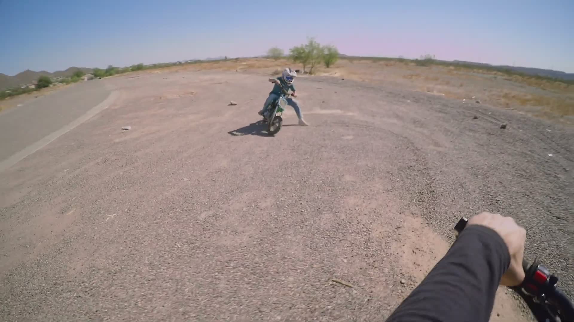 Mini motorcycle drag race competition between friends