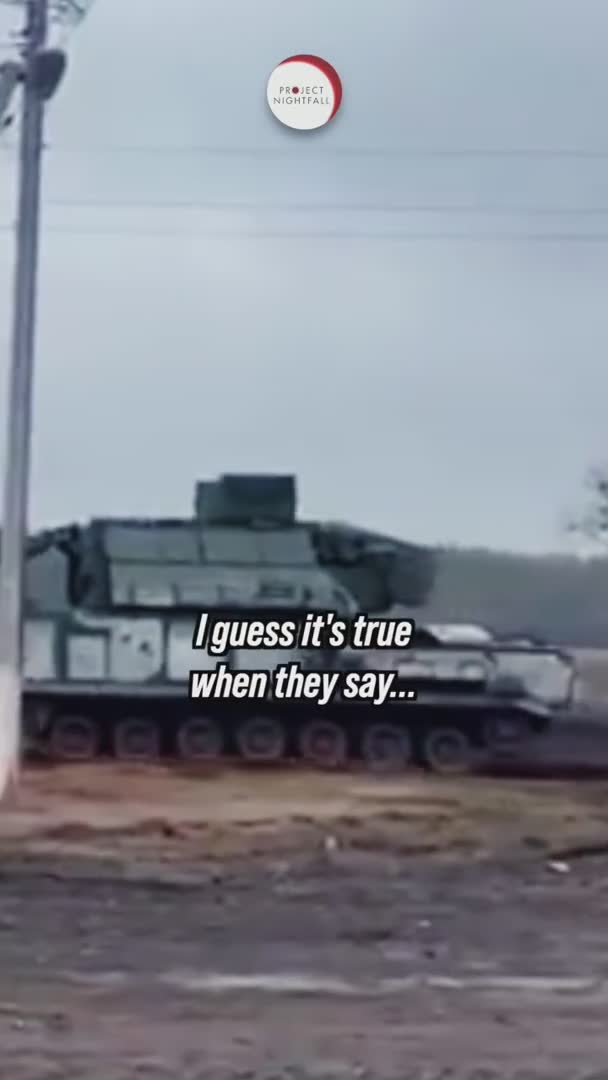 Ukrainian civilians towing military vehicles with farm equipment