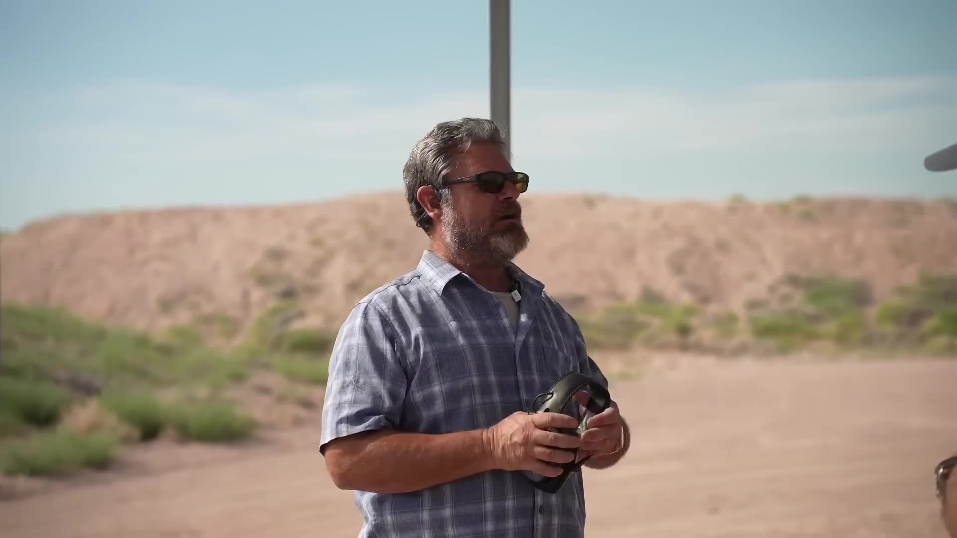 Dangerous physics of attempting to disarm someone mid-shot demonstration