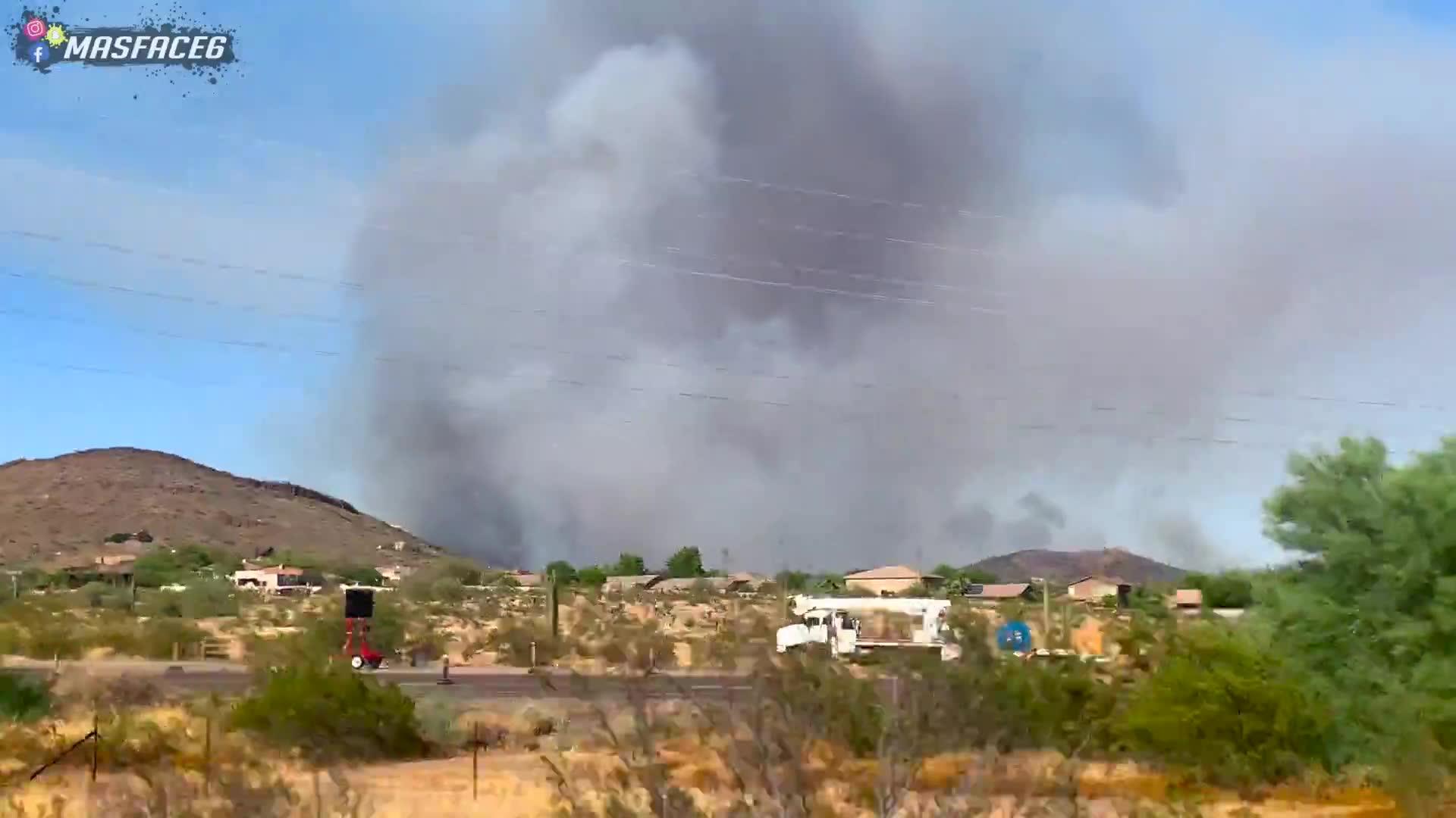 Wildfires threaten local area forcing evacuations during motorcycle documentation
