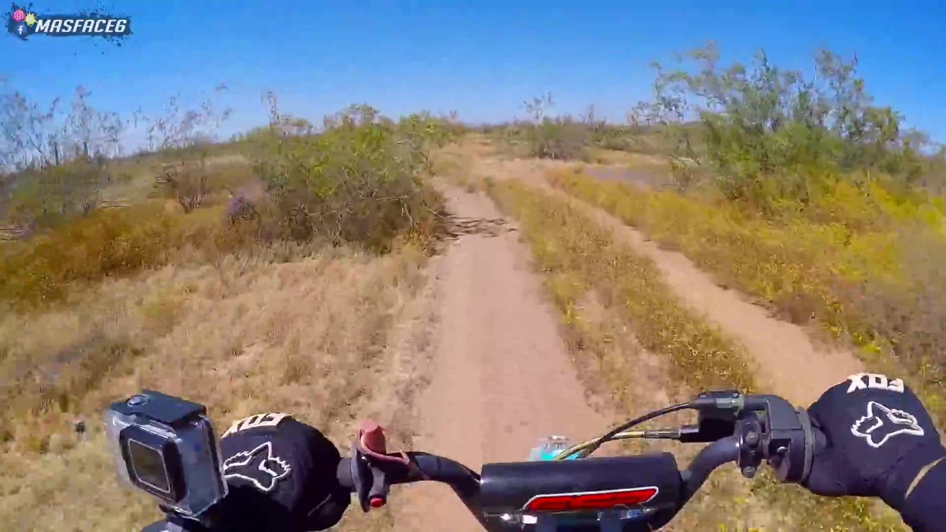 Aggressive riding and jumping on small mini dirt bike