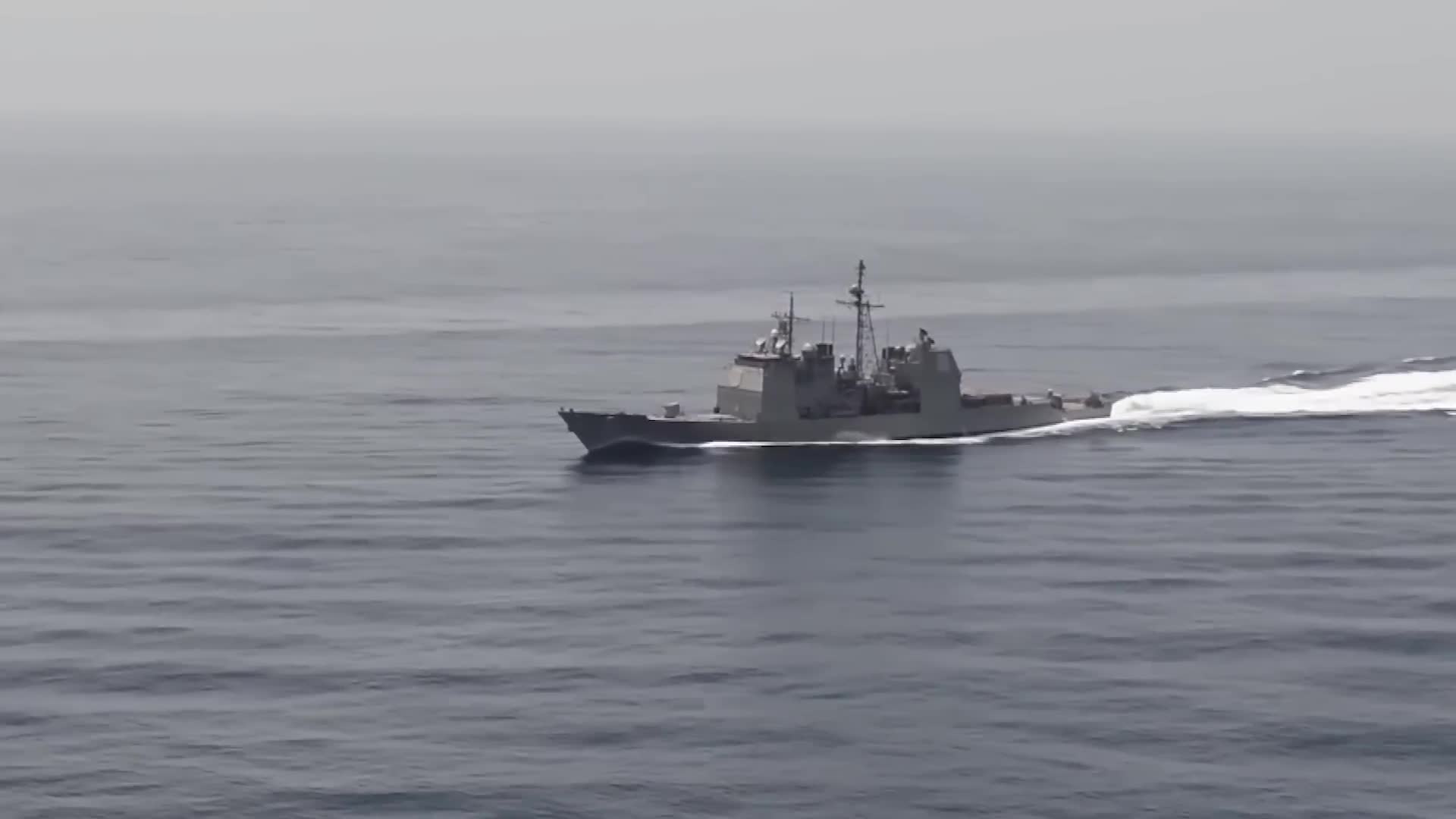Smuggling boat challenges American cruiser