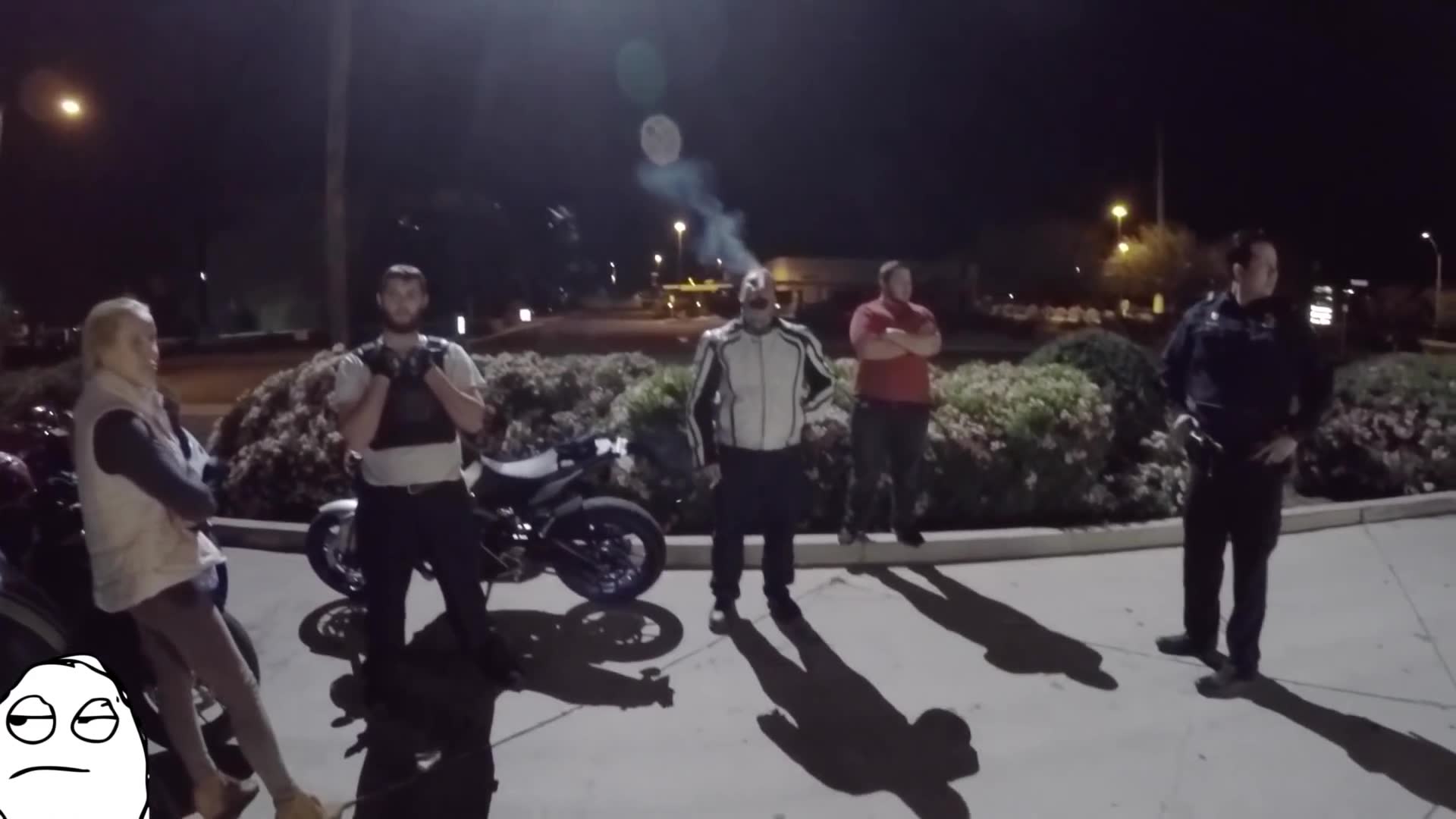 Police helicopter circles overhead while sport bike riders cruise through the city streets