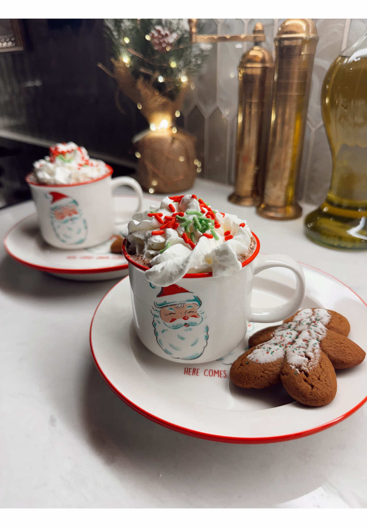 Christmas hot chocolate gingerbread cookies santa mugs while discussing large pizza