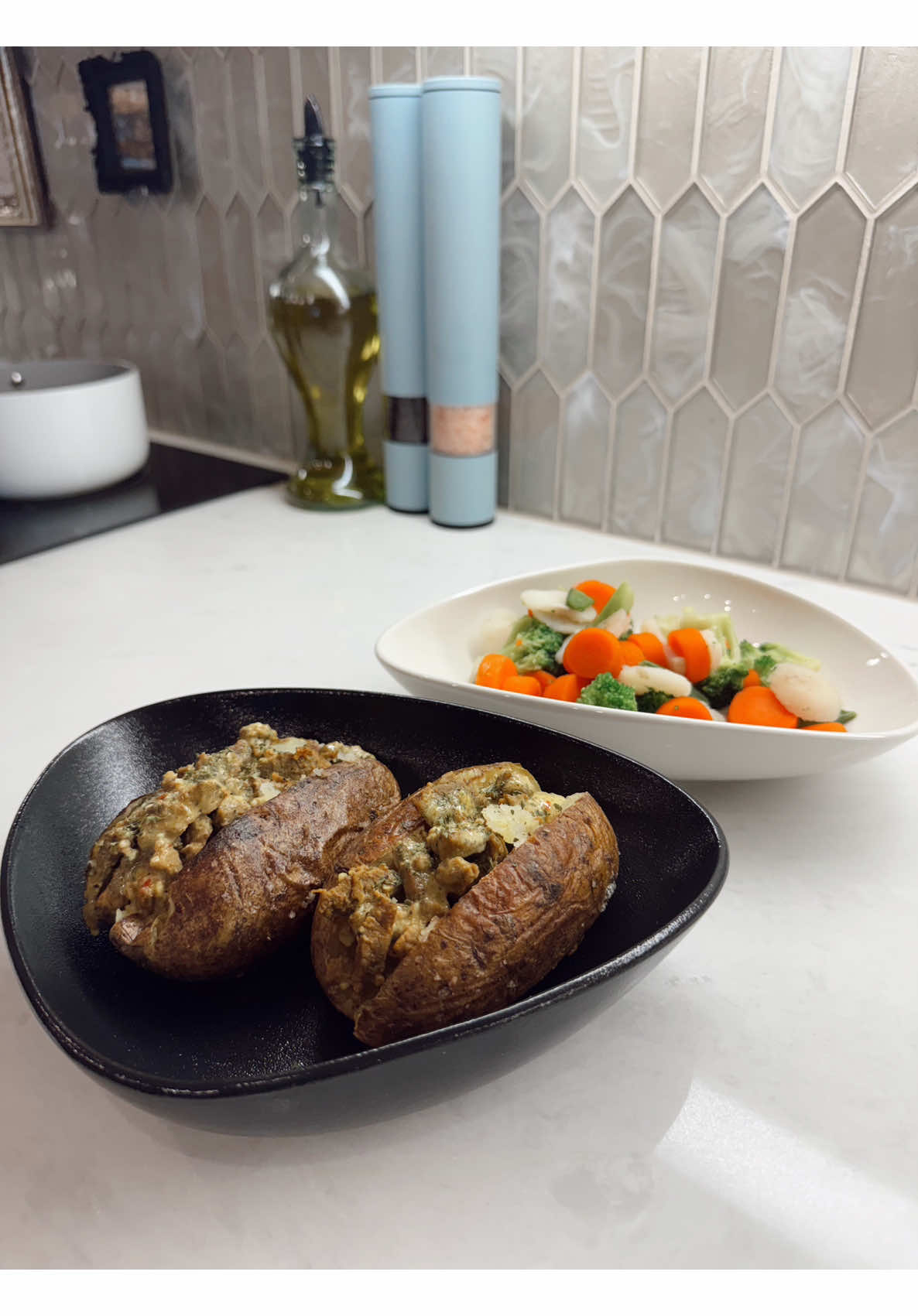 Learn to make creamy stuffed baked potatoes with healthy steamed vegetables