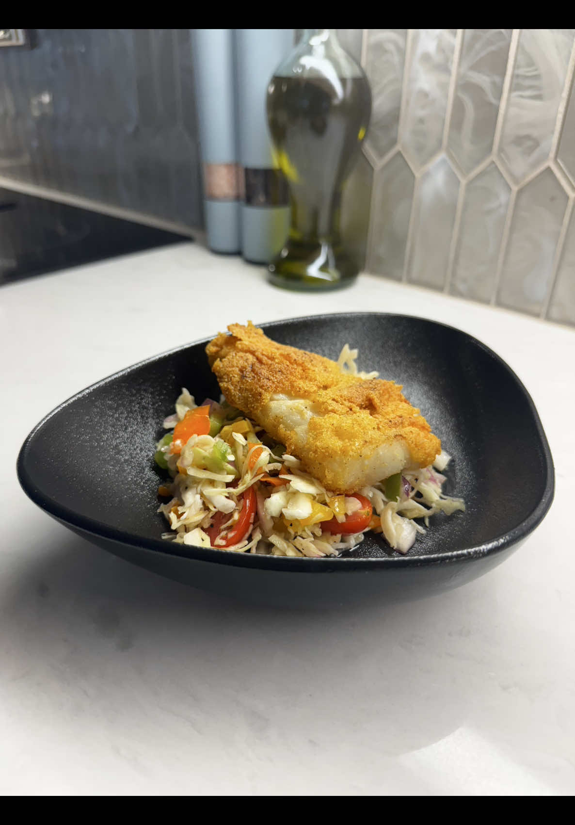 Crispy breaded fish colorful cabbage and bell pepper slaw homemade dinner