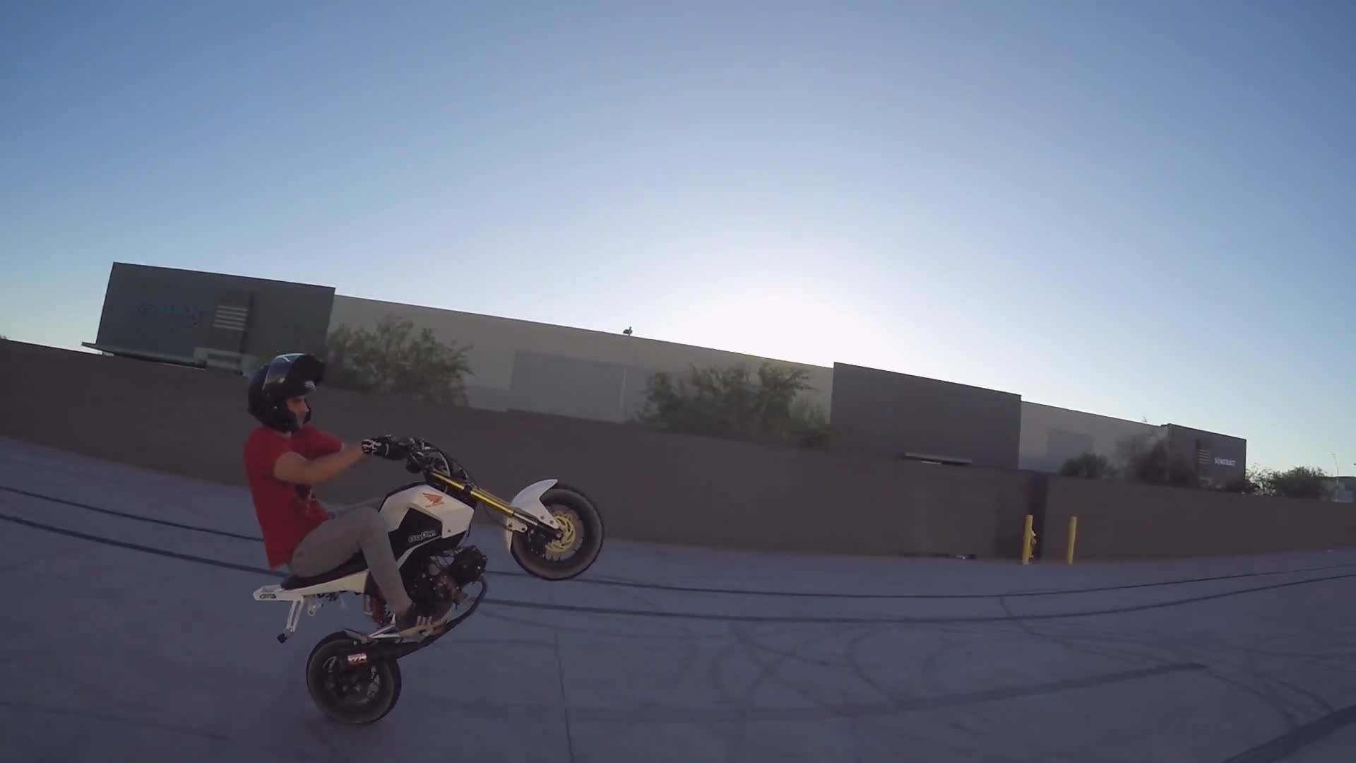 Advanced technique for shifting gears while maintaining a wheelie without dropping it