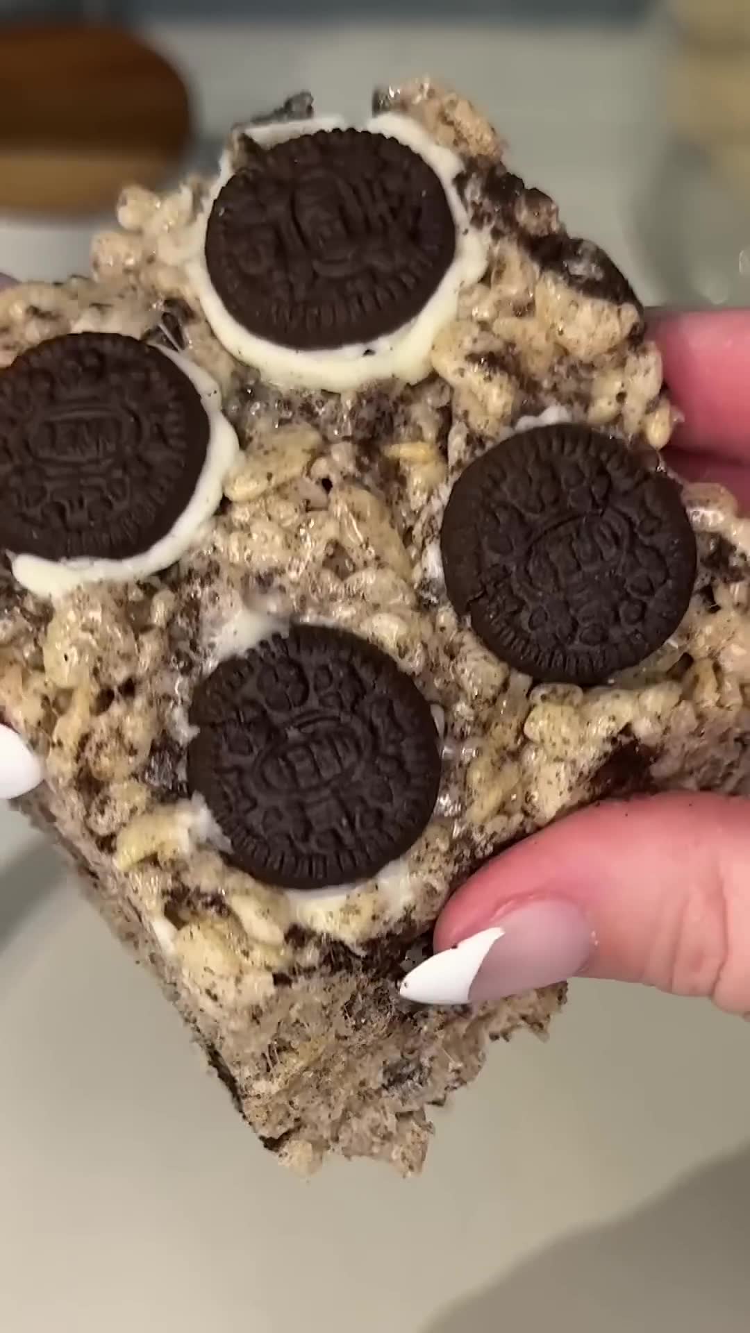 Rice cereal squares incorporate cookies and cream flavor profile