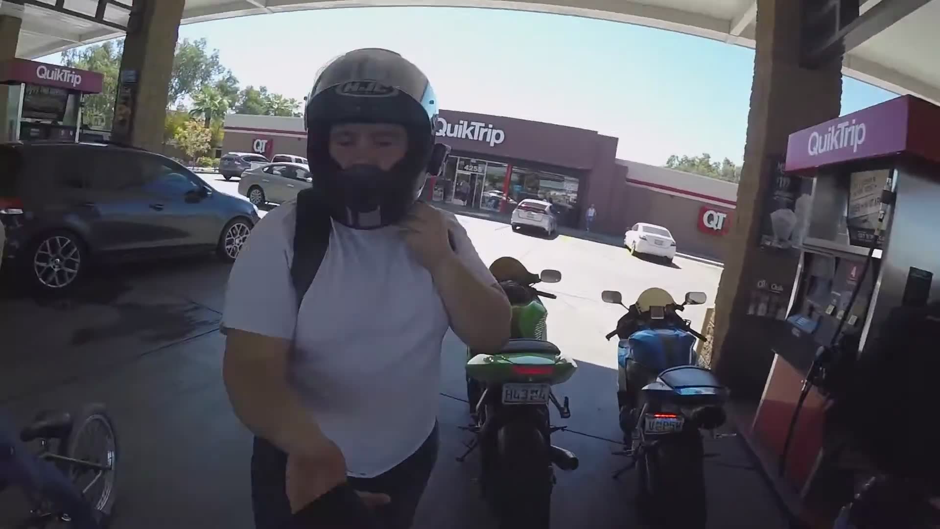 Fifth gas station stop documented caught on camera during motorcycle adventure