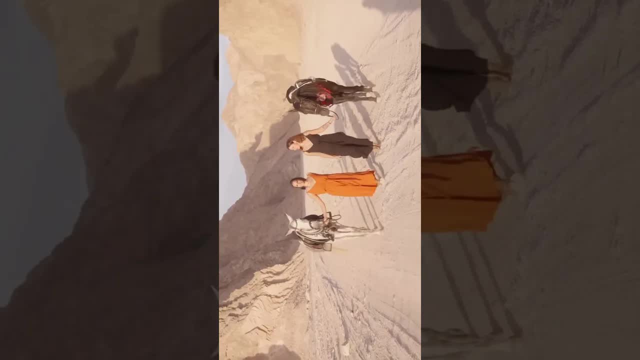 Two women, two souls, riding through the silence of Wadi Gnai.