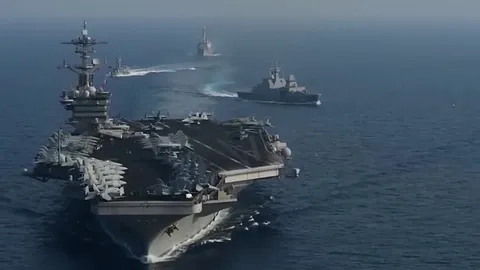 Regional militants challenge American supercarrier battle group in Red Sea