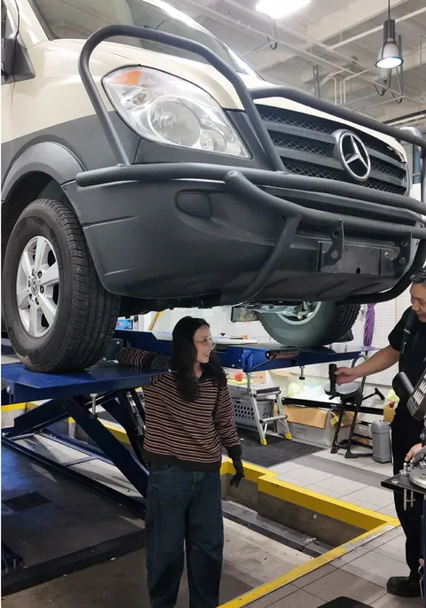 Checking all fluids and filters during a thorough van inspection