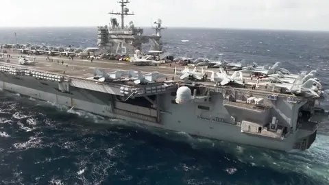 Complete operational picture of supercarrier preparing for combat deployment