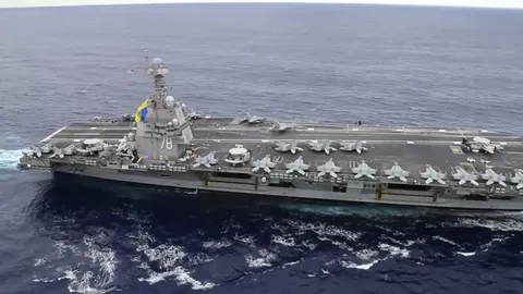 Venezuelan fighter aircraft approaches carrier at dangerously low altitude