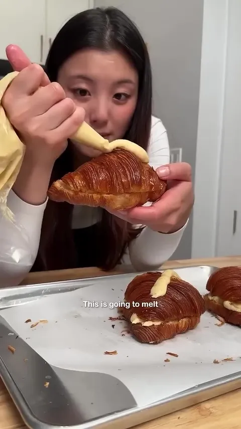 Step-by-step tutorial for making almond croissants at home