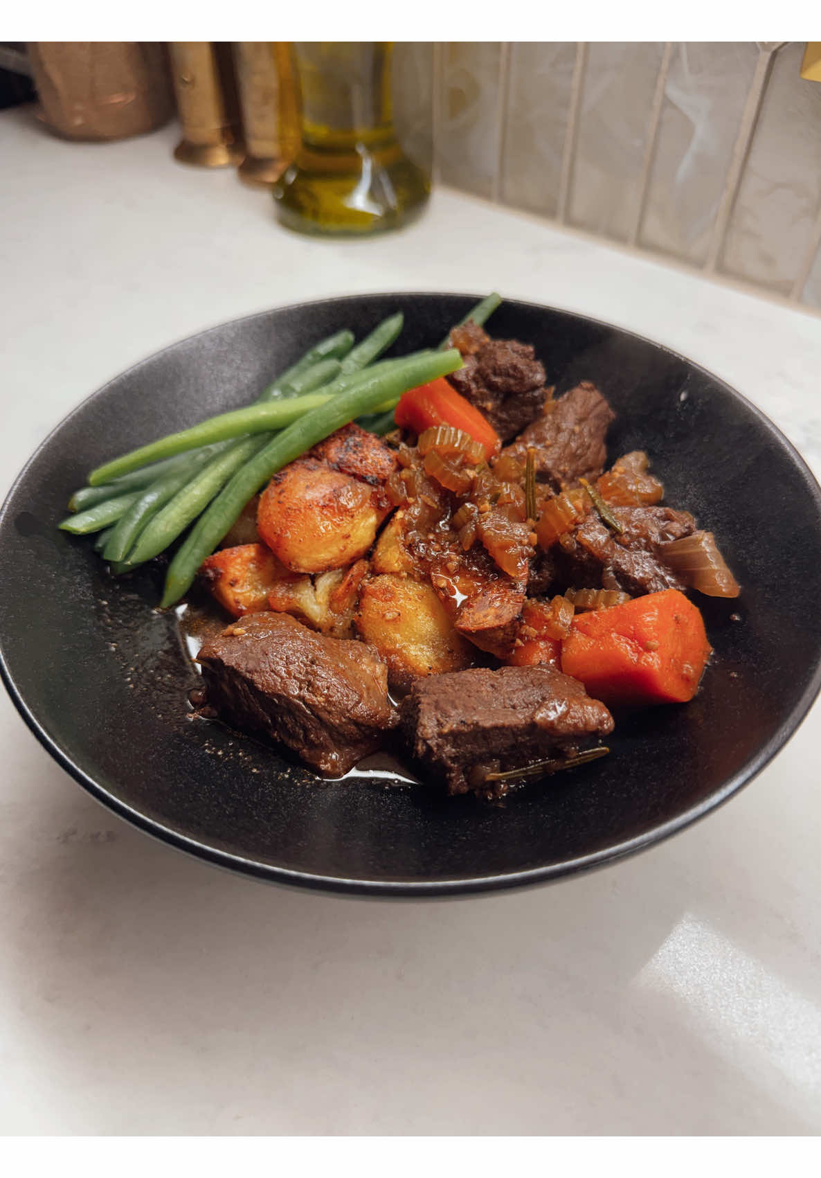 Nice and easy to fall in love with hearty beef stew potatoes carrots green beans