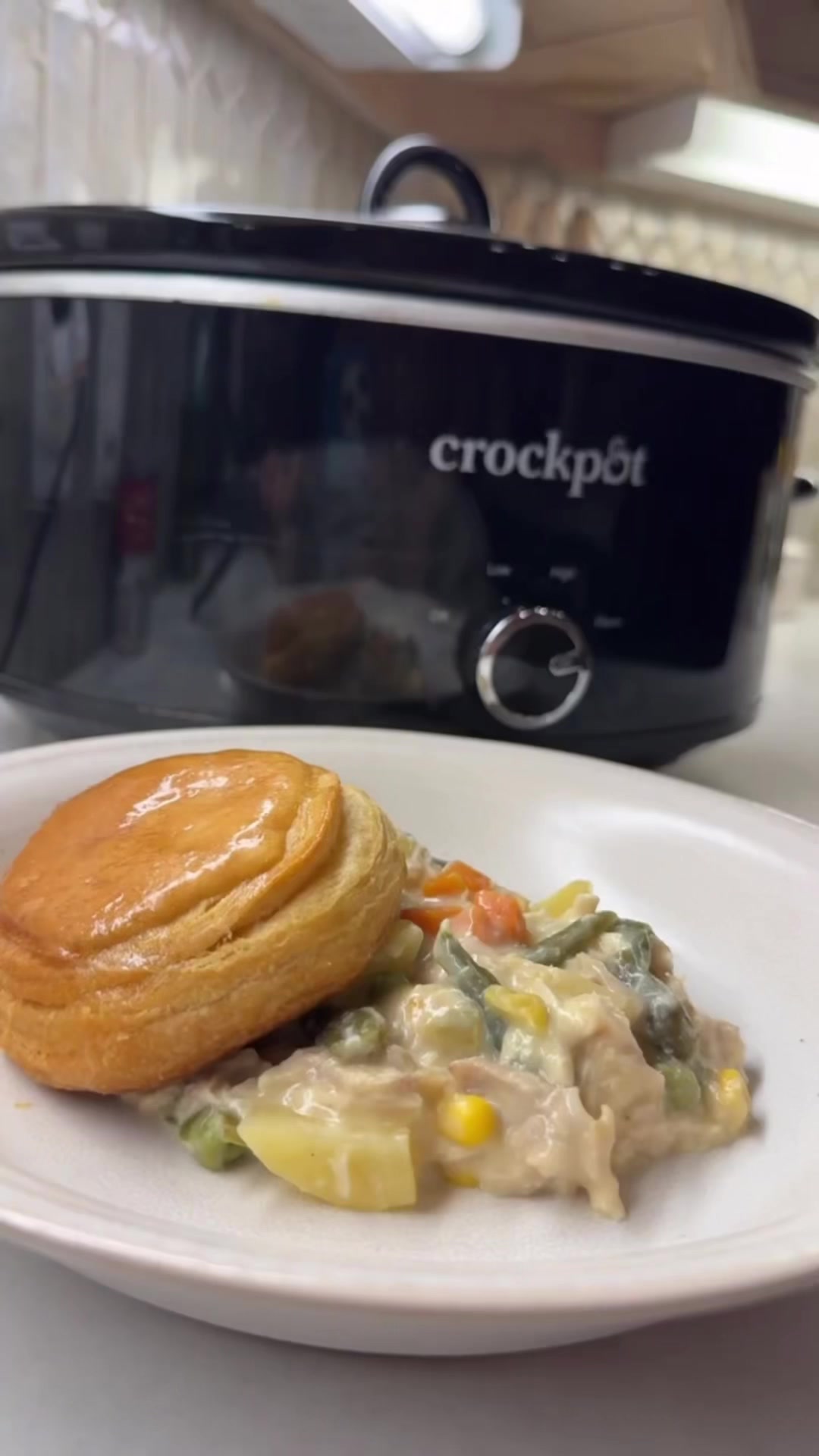 Crockpot chicken pot pie with flaky biscuit easy dinner for weeknight meal