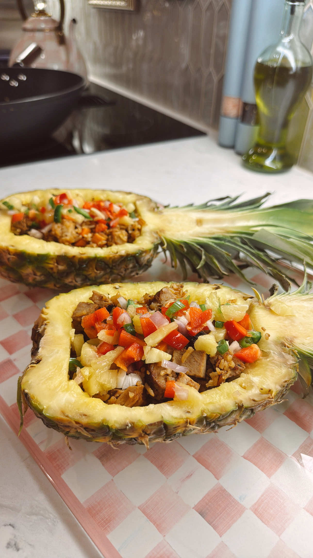 Pineapple boat fried rice recipe with diced meat peppers and onions