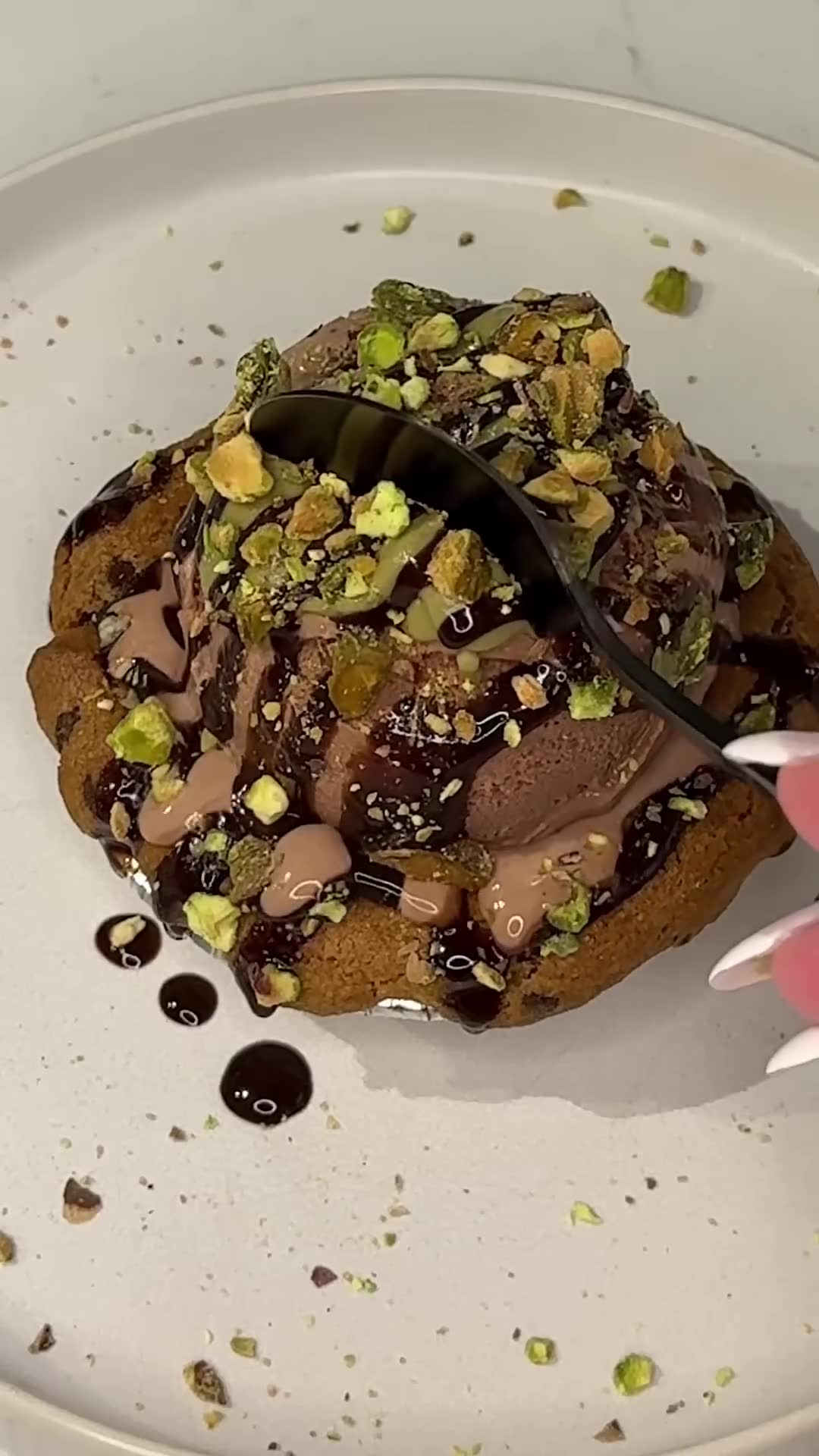 Warm cookie baked in small pan features crunchy filling surprise