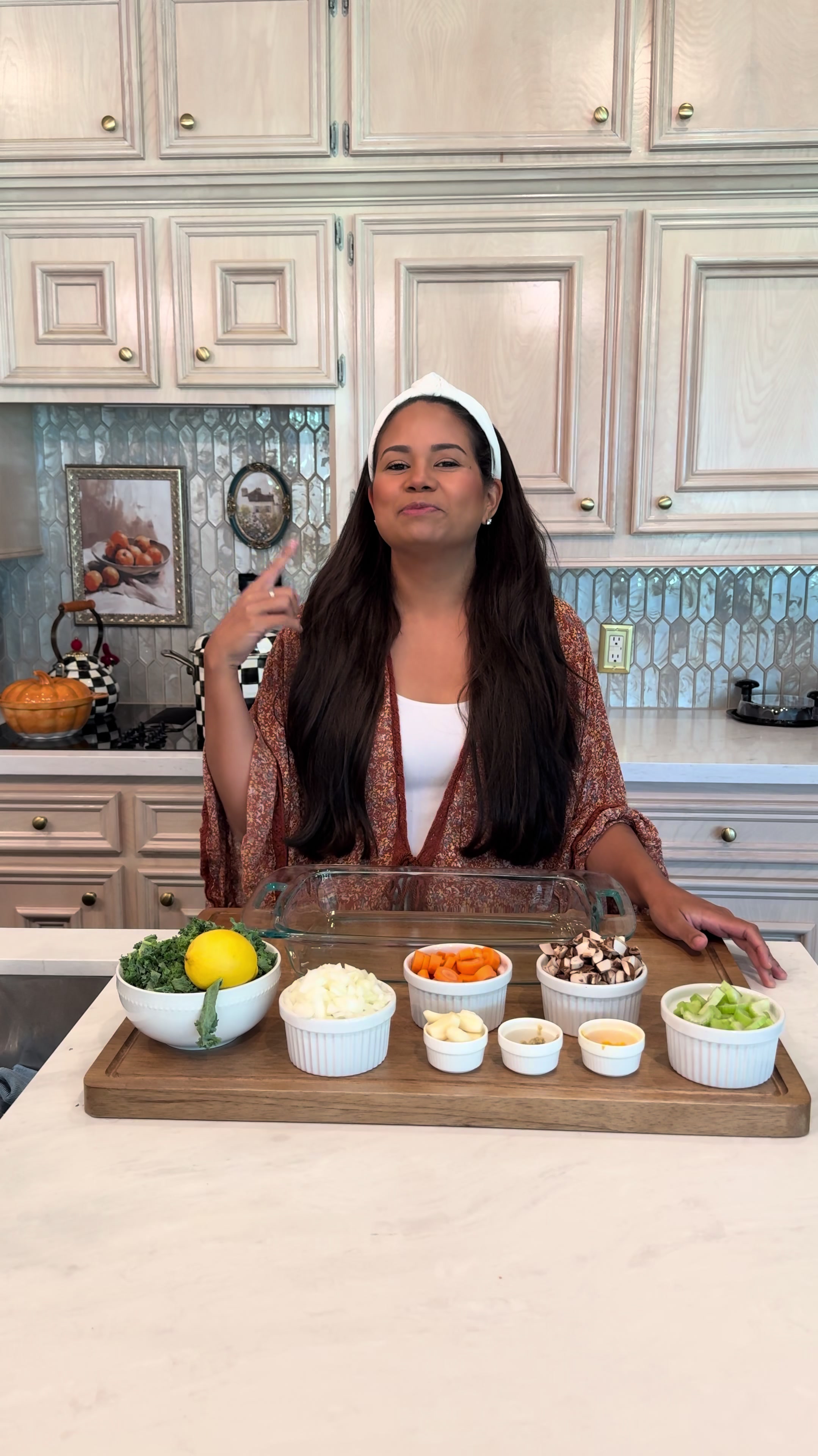 Woman presenting immunity chicken soup recipe for back to school health with fresh chopped