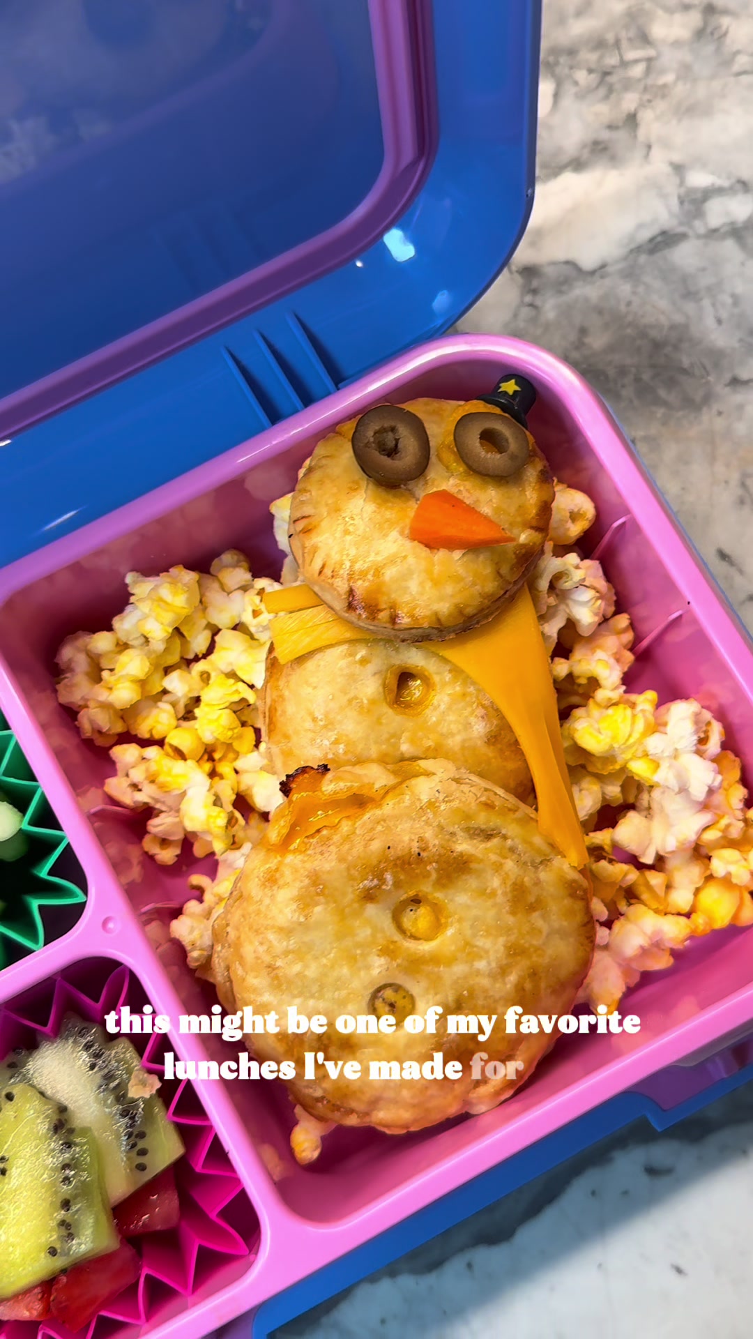 Christmas-themed pastries shaped into snowmen with protein filling