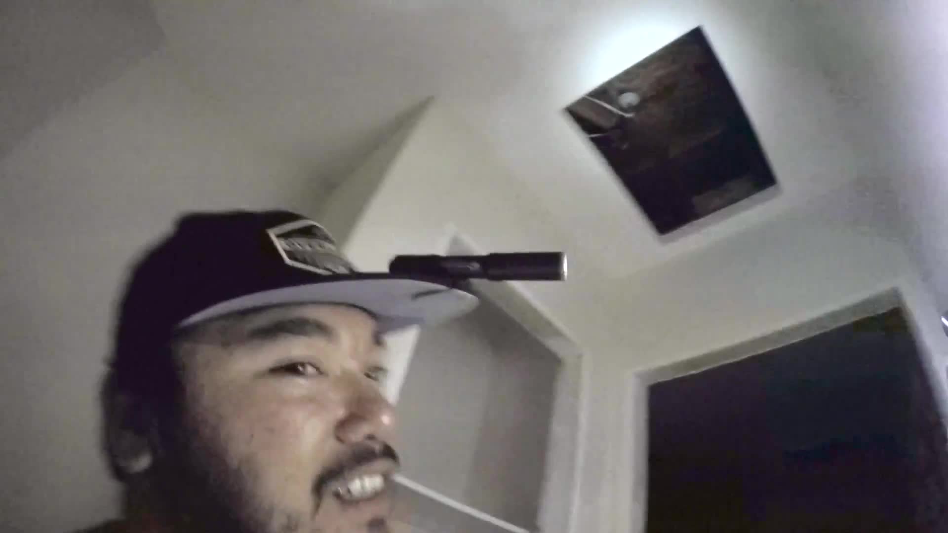 We explored an abandoned house and i climbed in the attic... caught on camera during motorcycle a...