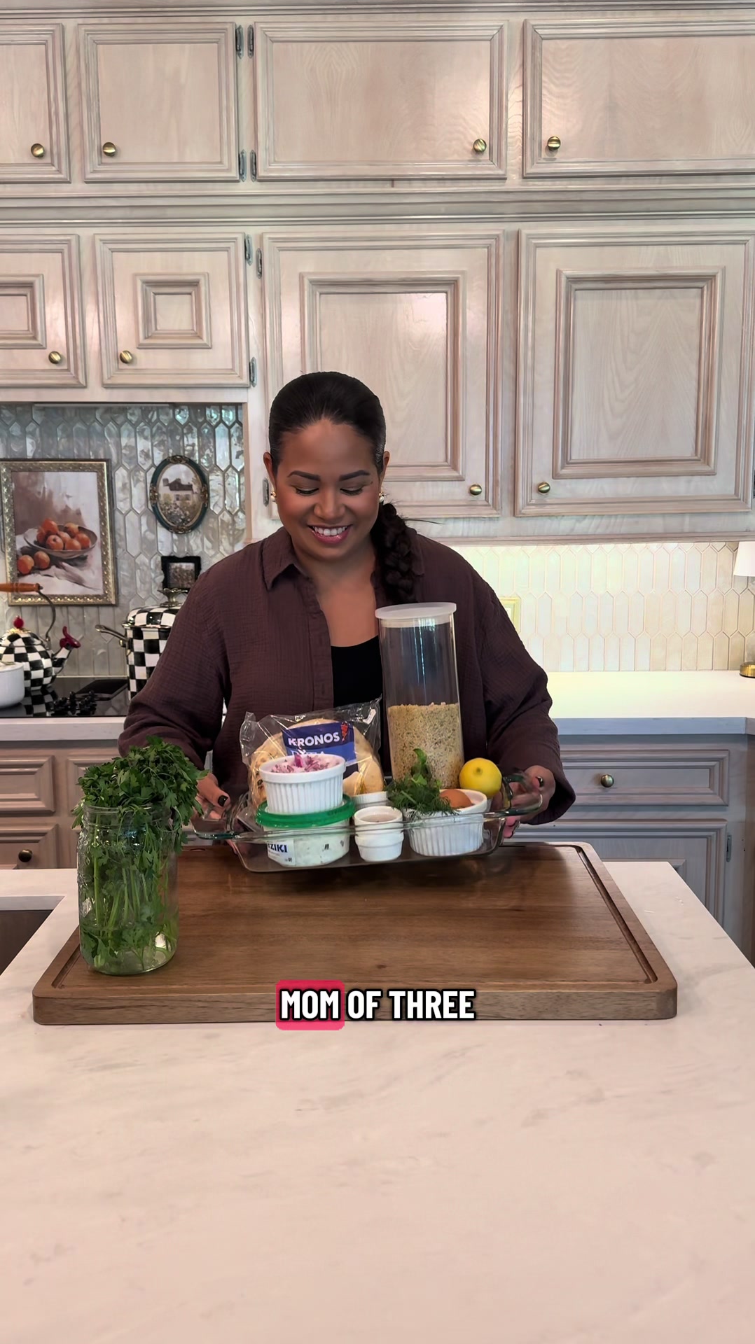 Stay at home mom of three cooks delicious greek meatballs dinner recipe with pita and