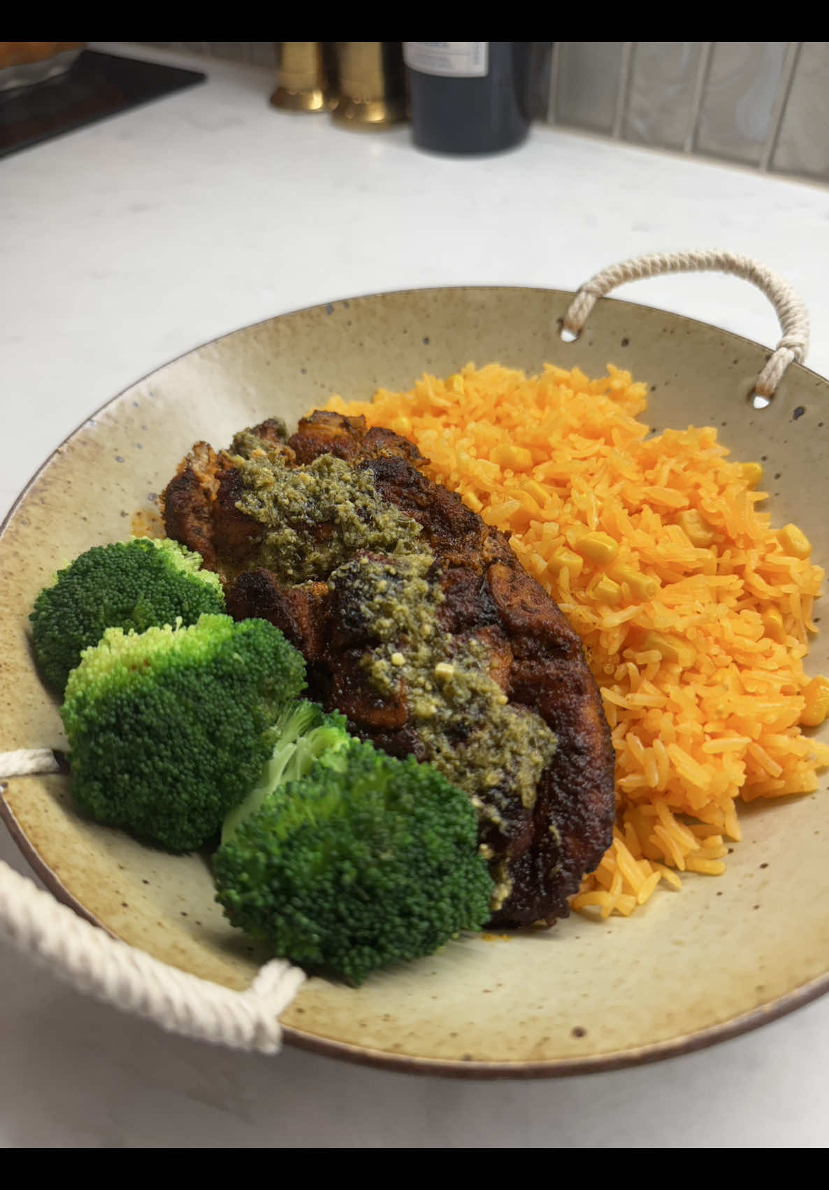 Cris cross butter chicken dinner recipe with orange rice and broccoli