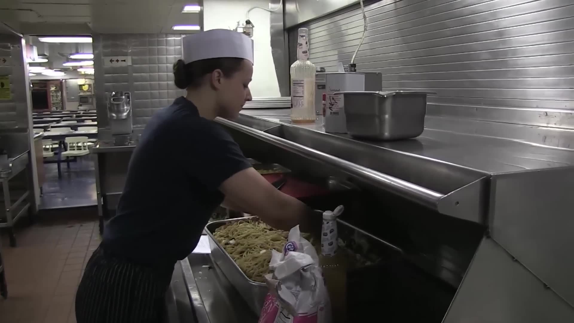 Holiday meal preparation aboard deployed supercarrier maintains traditions