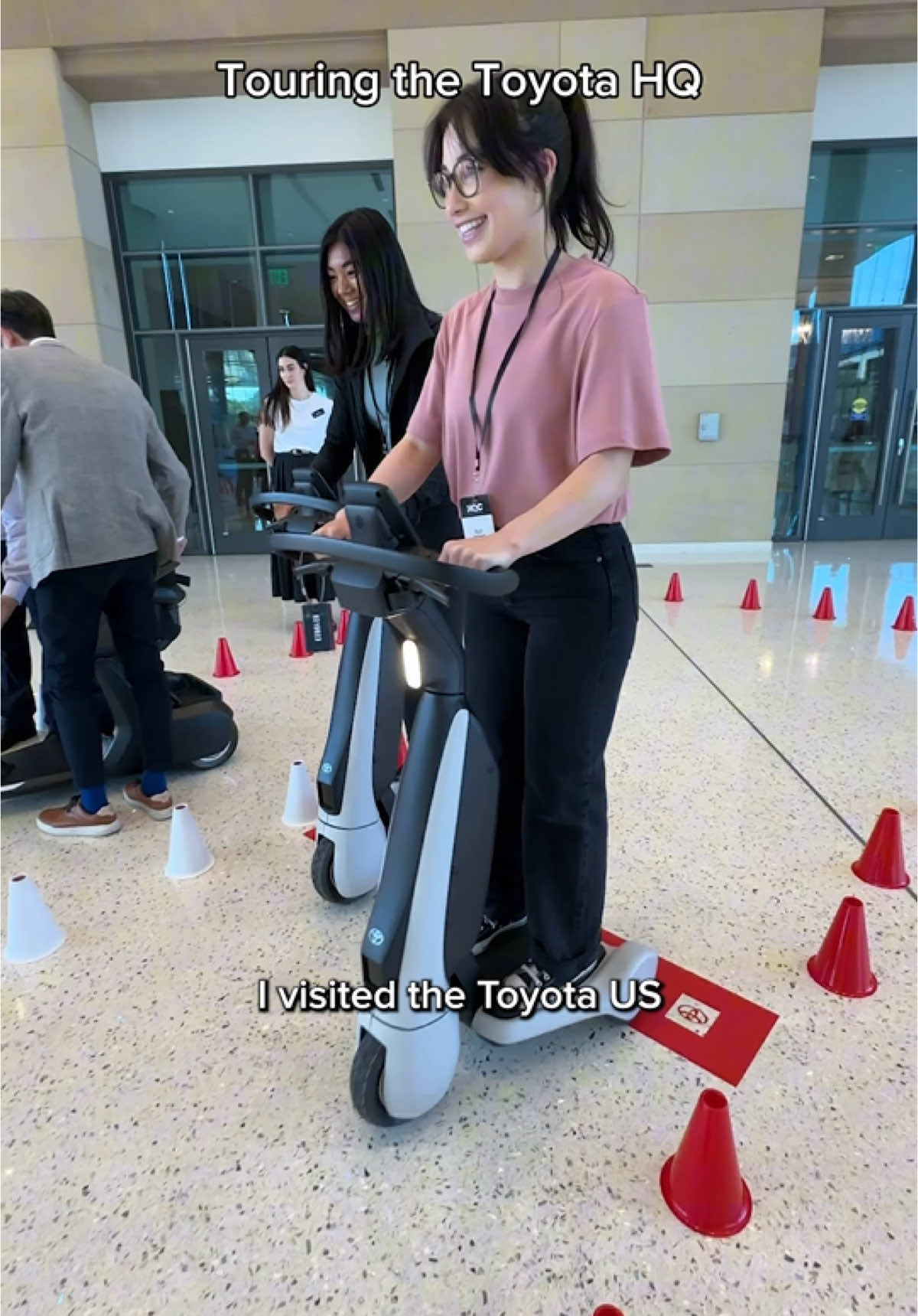 Touring Toyota's headquarters and riding personal mobility devices
