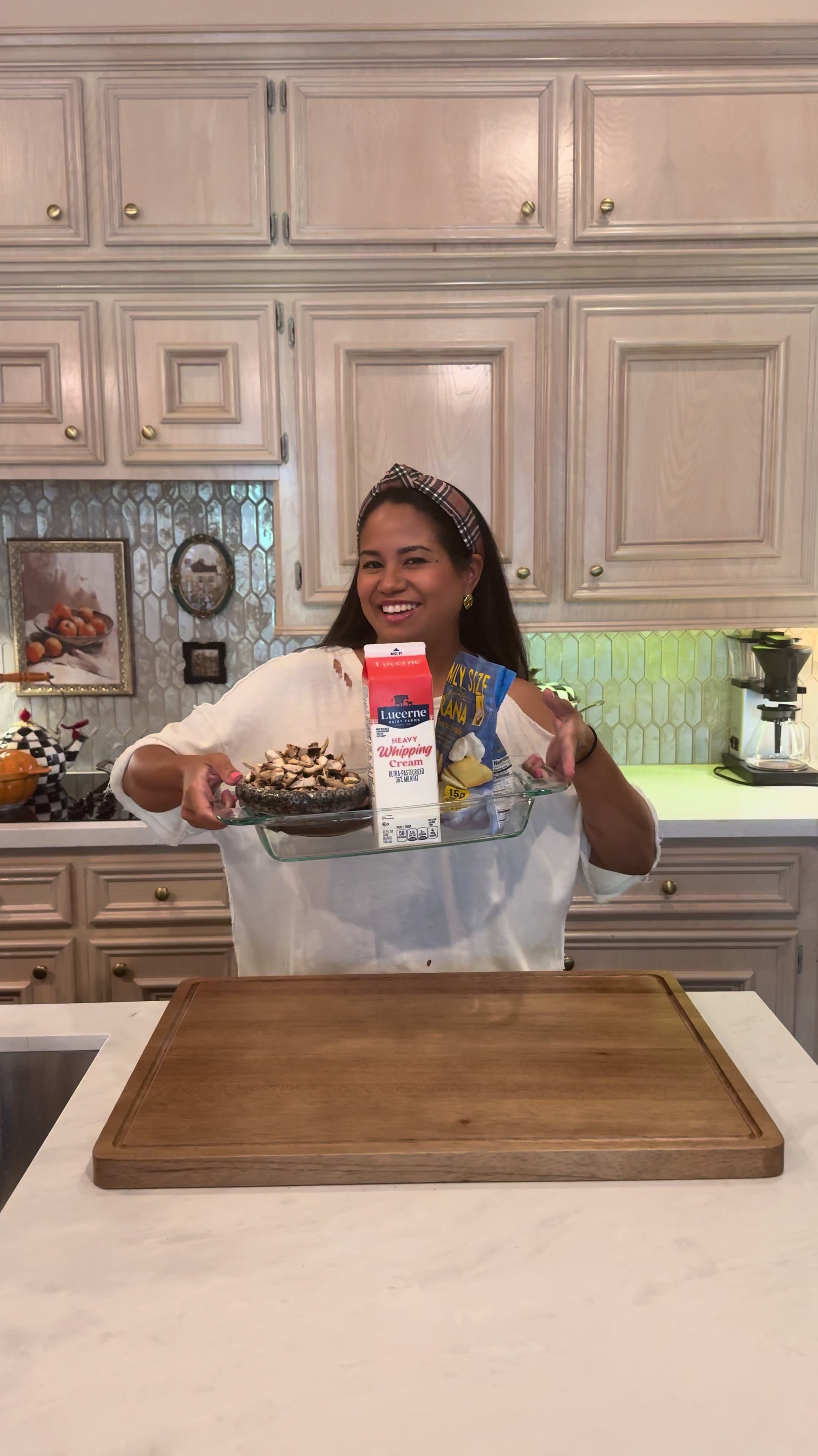 Smiling woman cooking easy one pot bacon mushroom tortellini dinner