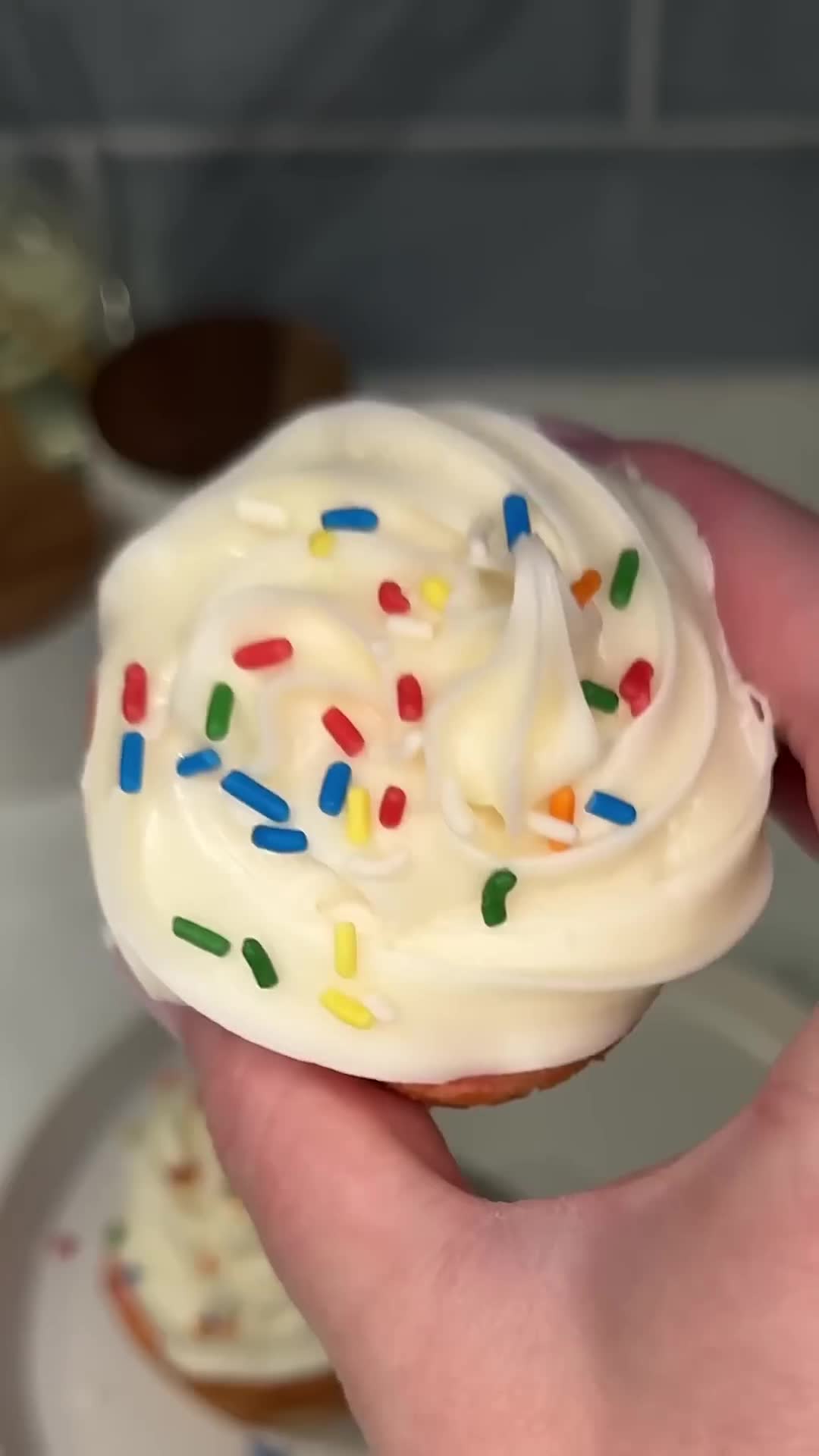 Sugar cookie bottom supports strawberry cake and frosting top