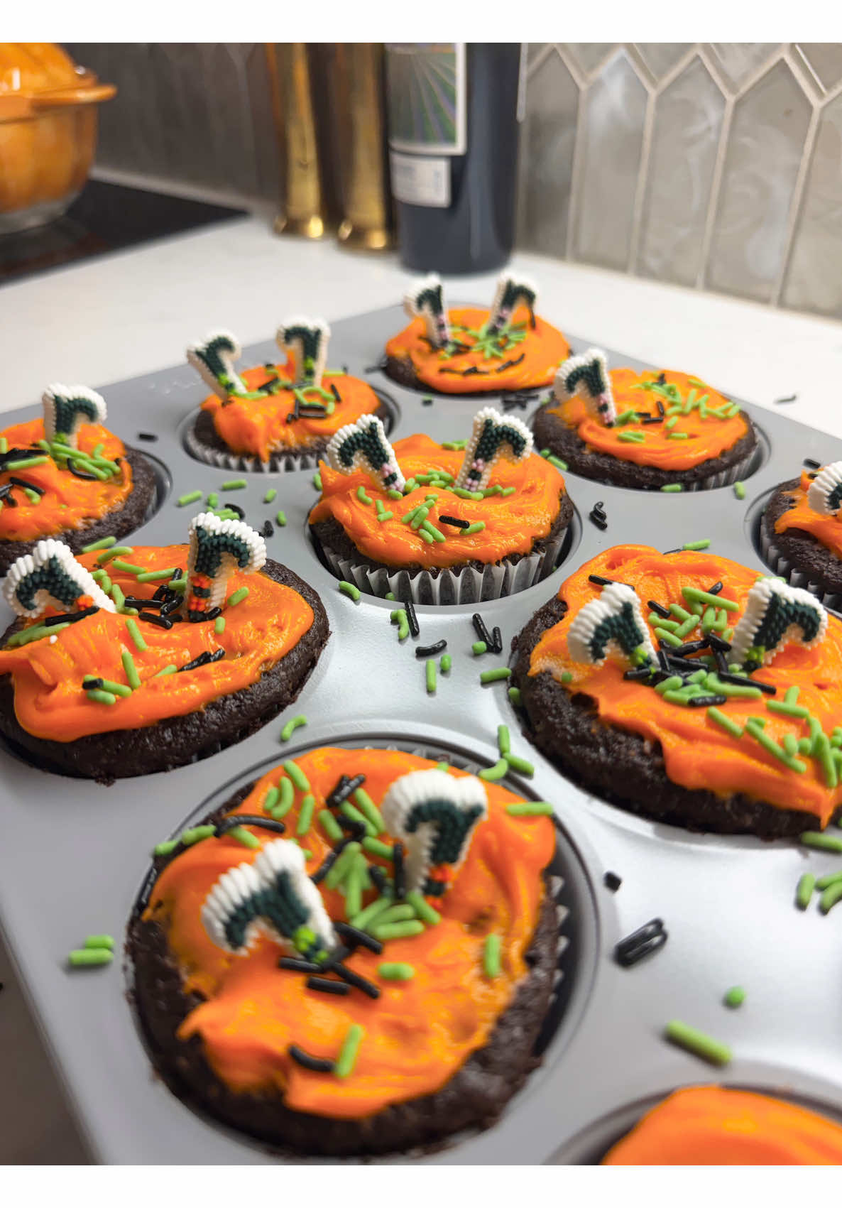 Easy halloween cupcakes orange frosting green black sprinkles spooky finger decorations