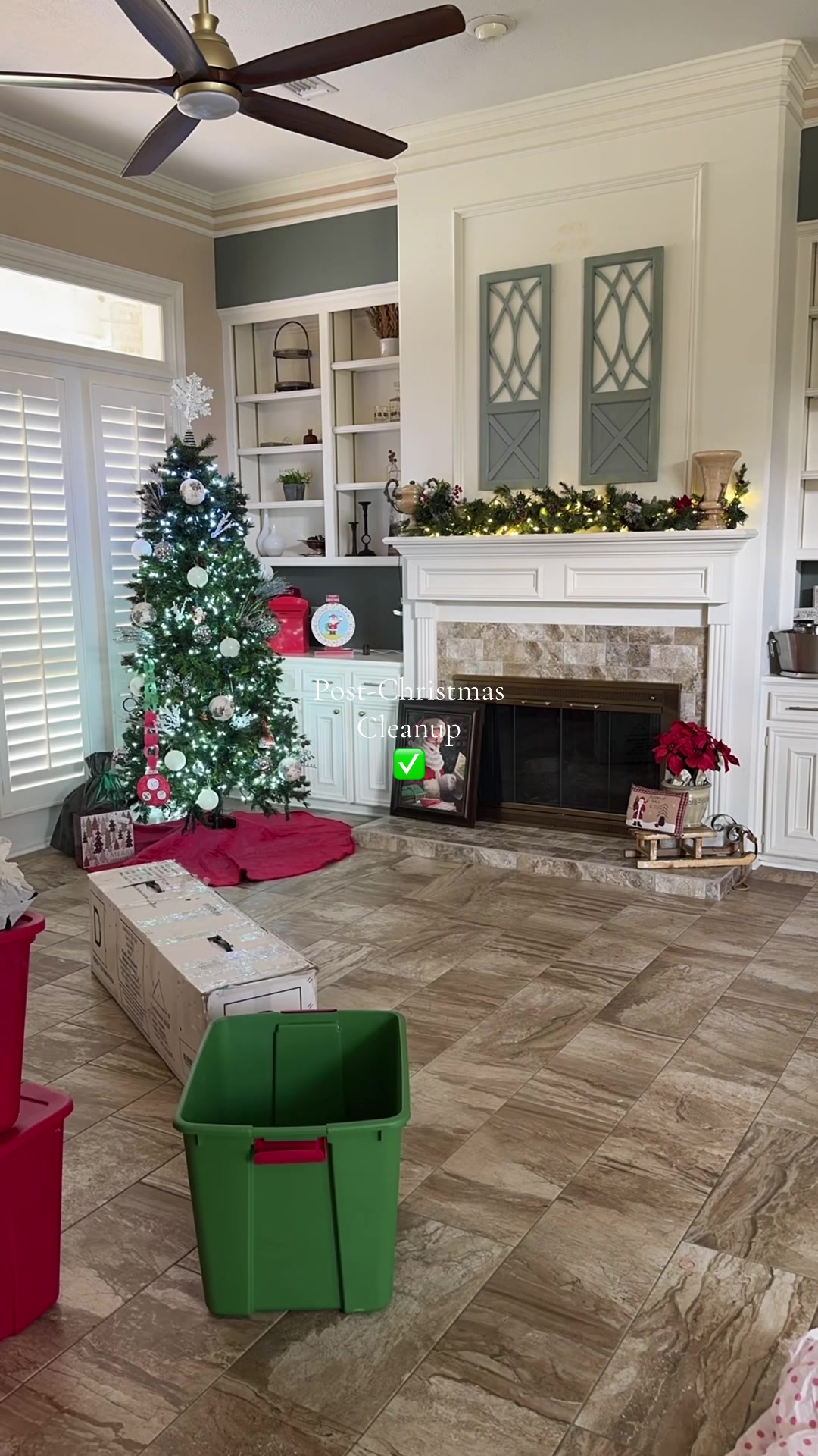 Post christmas cleanup taking down tree decorations packing storage bins