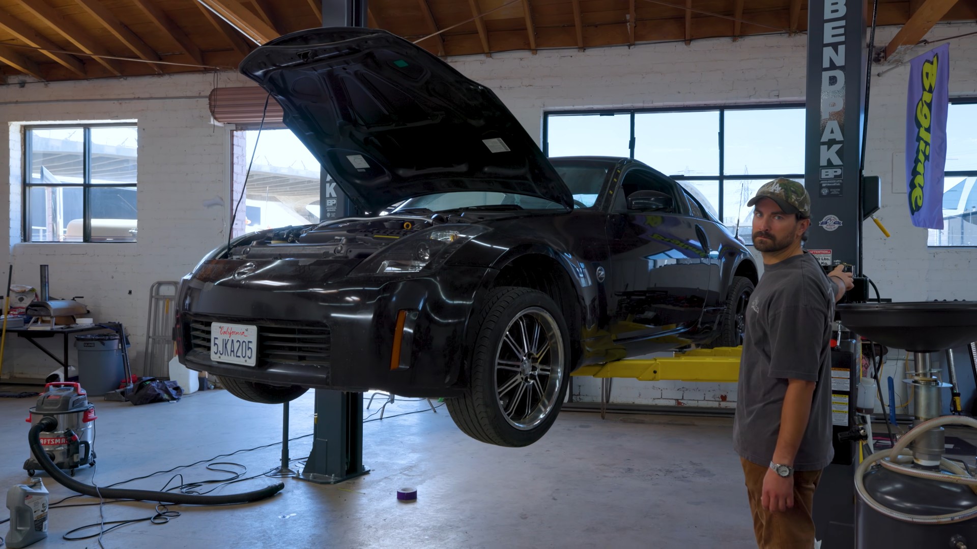 Using emergency epoxy to hold together our sports car's rear end