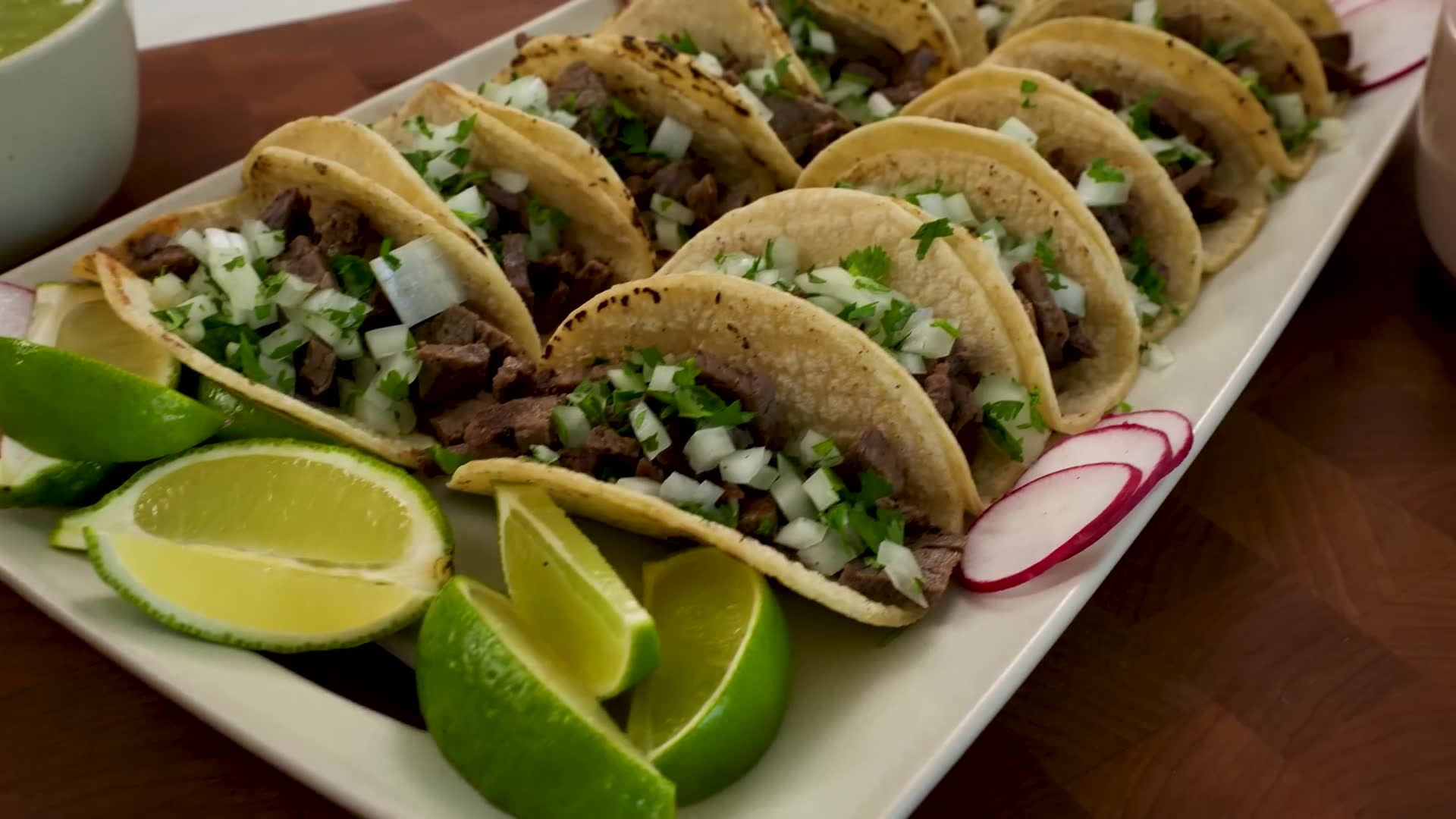 Real street-style beef tacos with red and green sauce