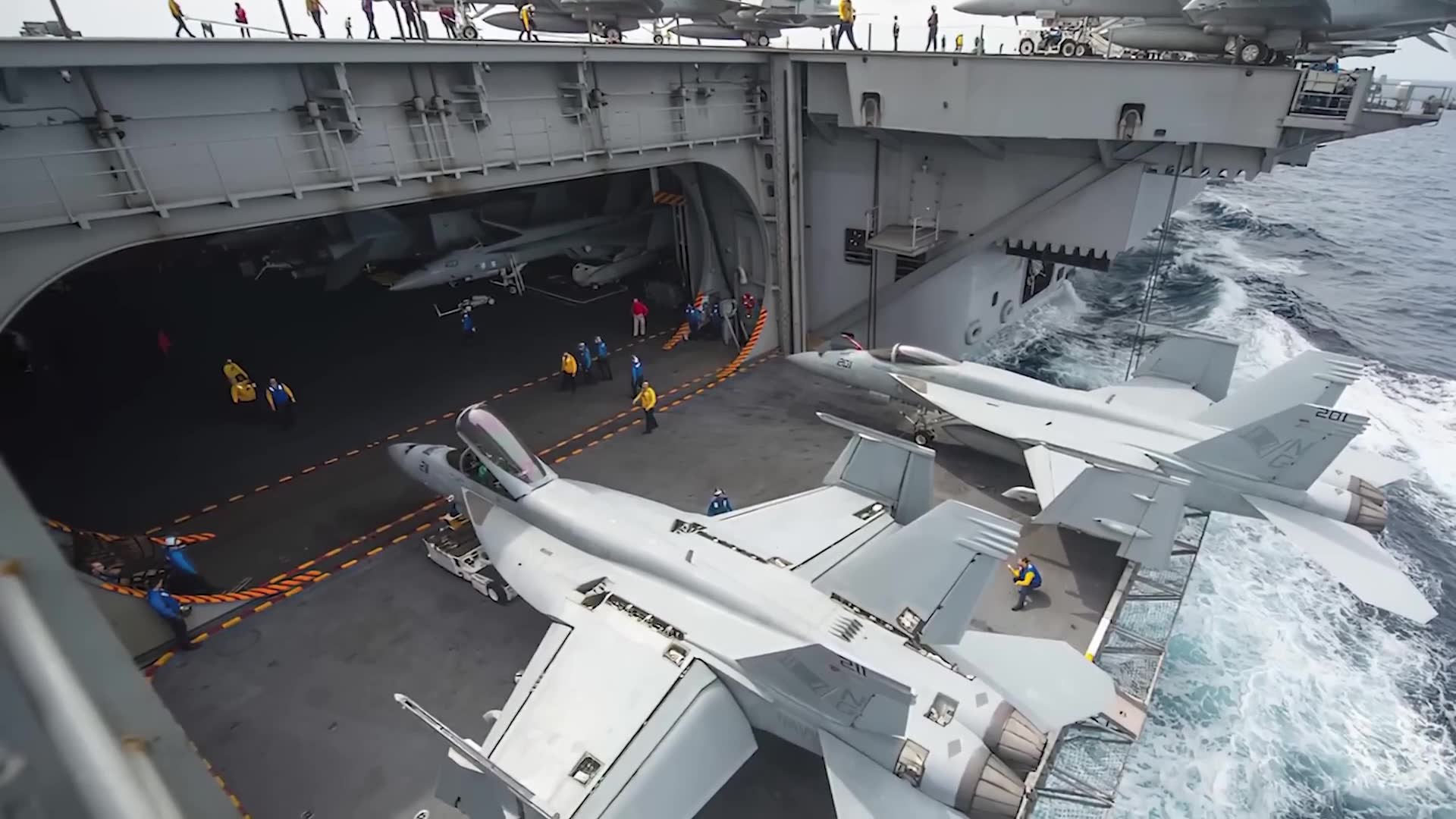 Aircraft elevator systems connecting hangar to deck