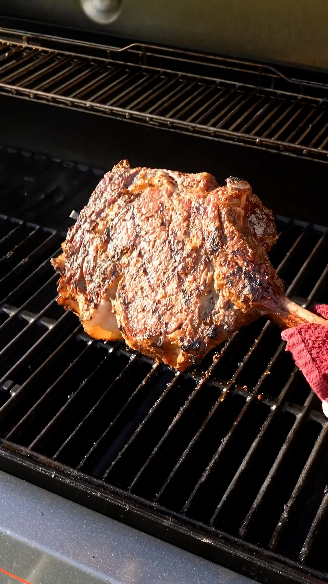 Smoked tomahawk ribeye finished with charred chimichurri sauce